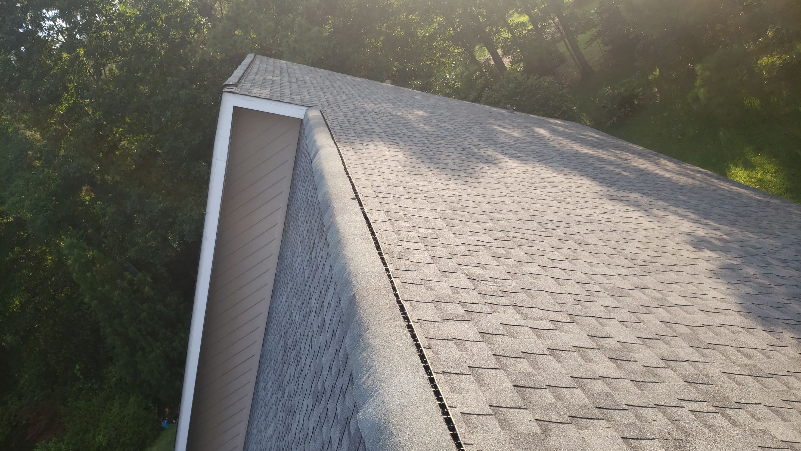 Residential Roofing Installation using Roof Replacement by American Roofing & Construction LLC