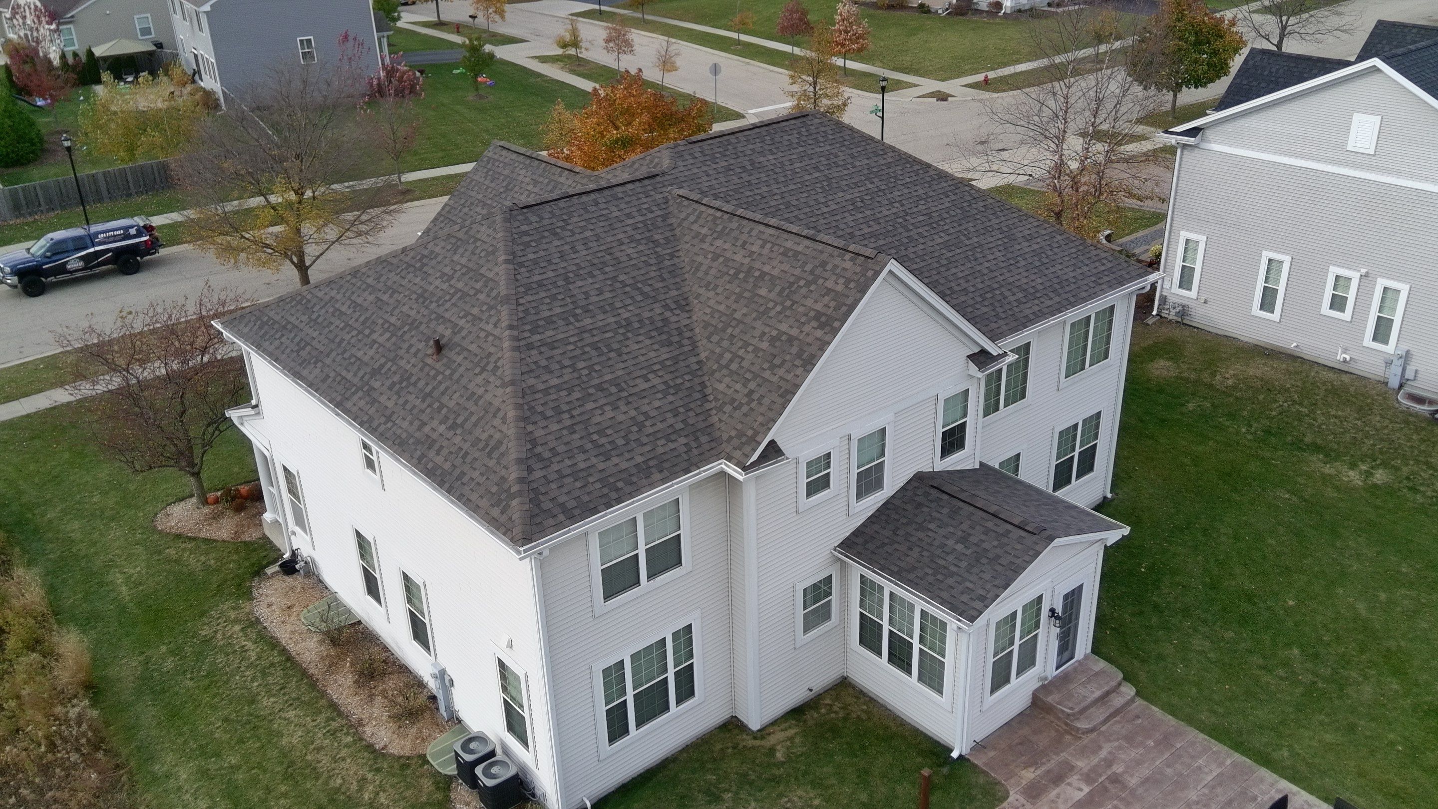 Re-roof: IKO Dynasty in DriftShake by Midwest Building Solutions