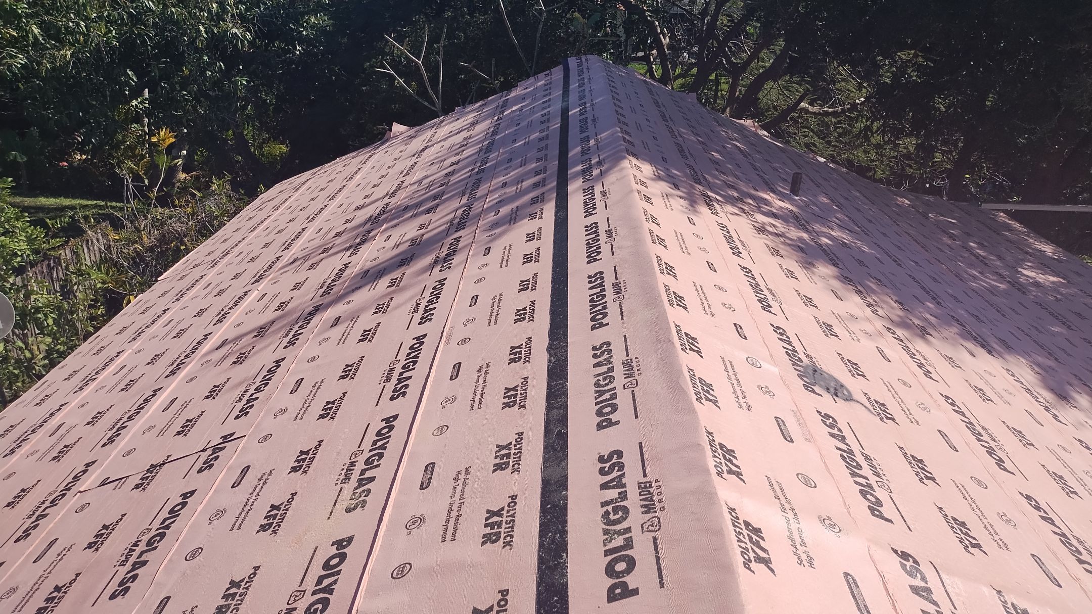 Residential Roofing Installation using 1" Nail strip metal roof by BLUES BROTHERS ROOFING