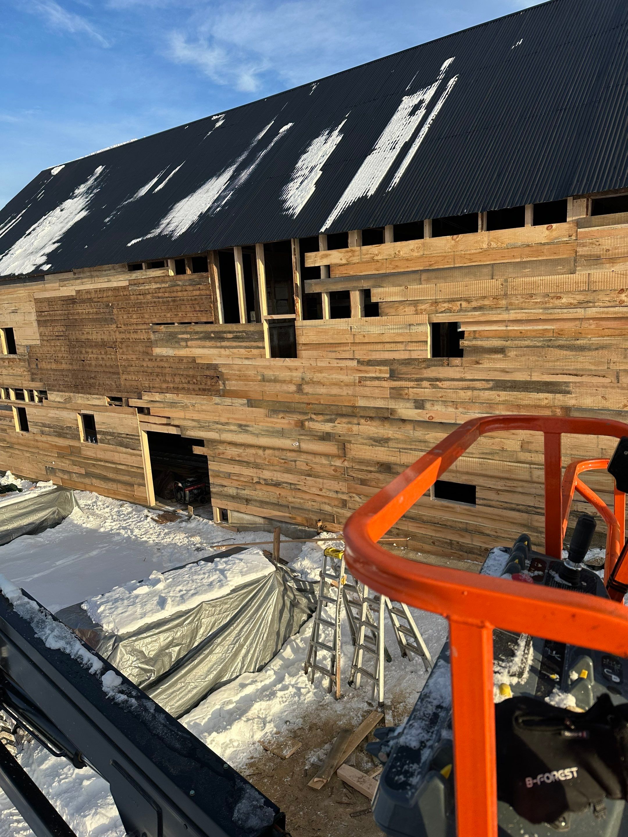 Barn Restoration and Board-and-Batten Siding Installation in Hansons Ridge by B's Roofing & Construction LLC