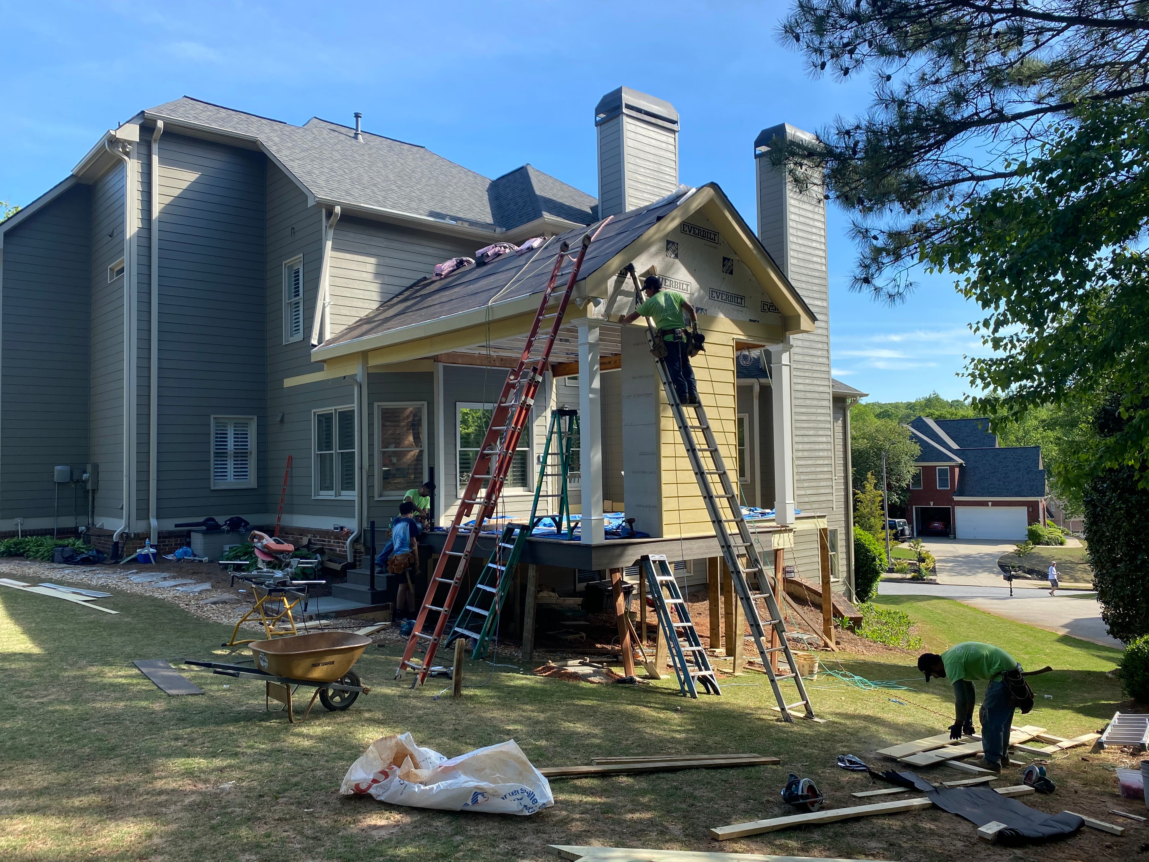 Covered Porch and Composite Deck Addition in Woodstock by Swift Home Renovations