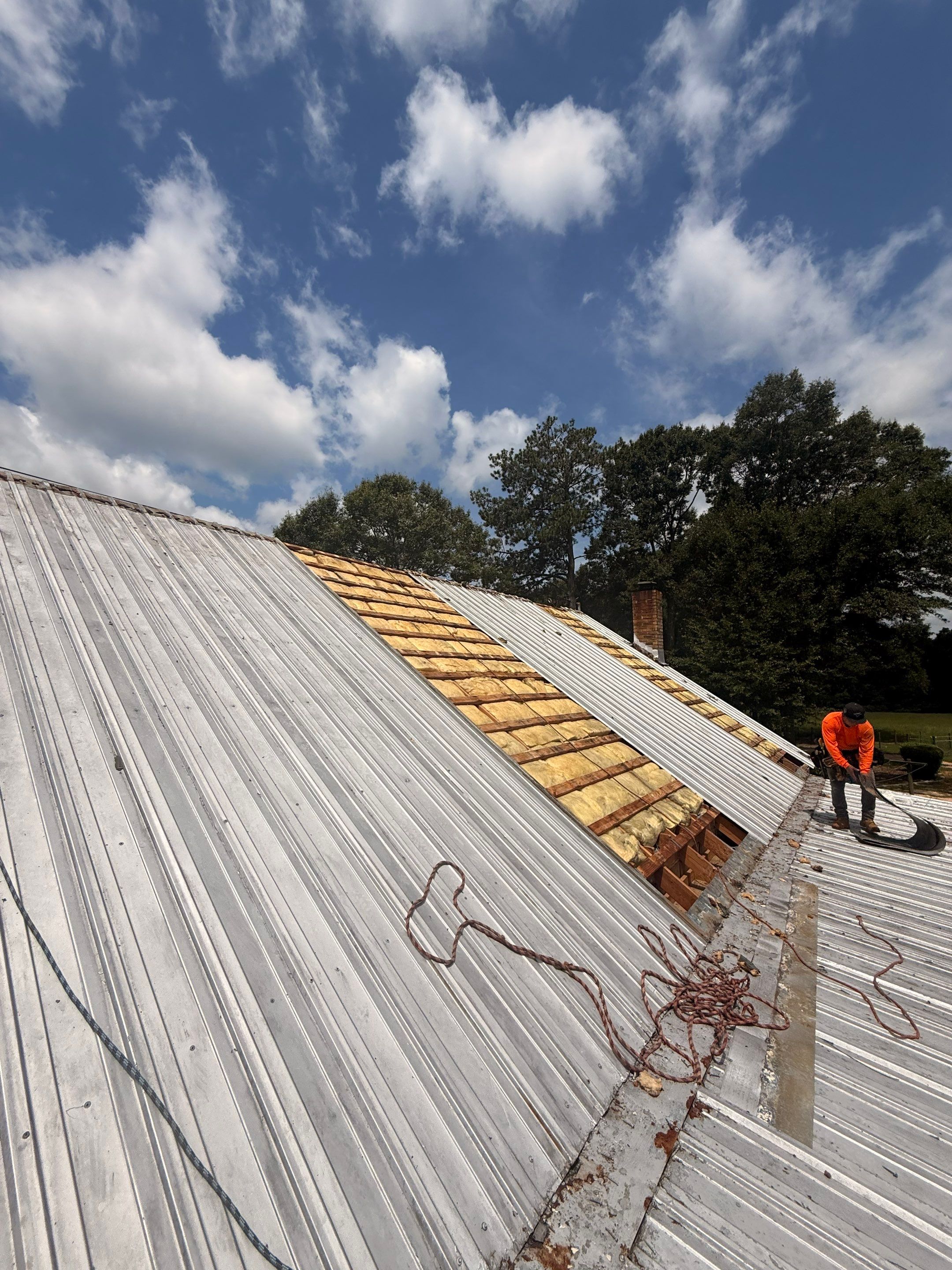 Residential Metal Roof Replacement With Corrugated Panels in Poplarville by Frontline Roofing