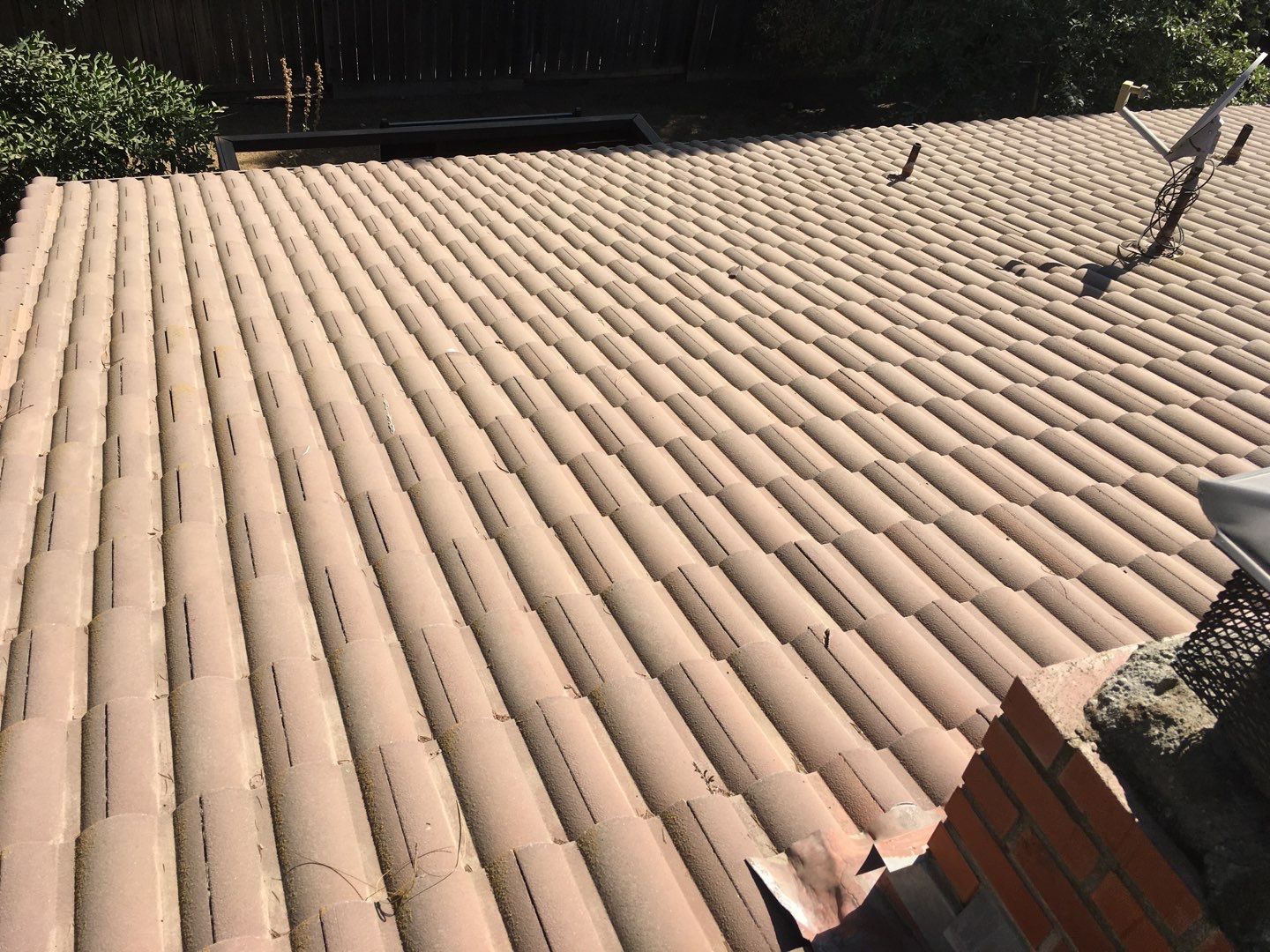 Tile roof remodel/ install OSB sheathing under tile and replace using OSB board with new underlayment, tile, and battens by Straight Edge Roofing Inc