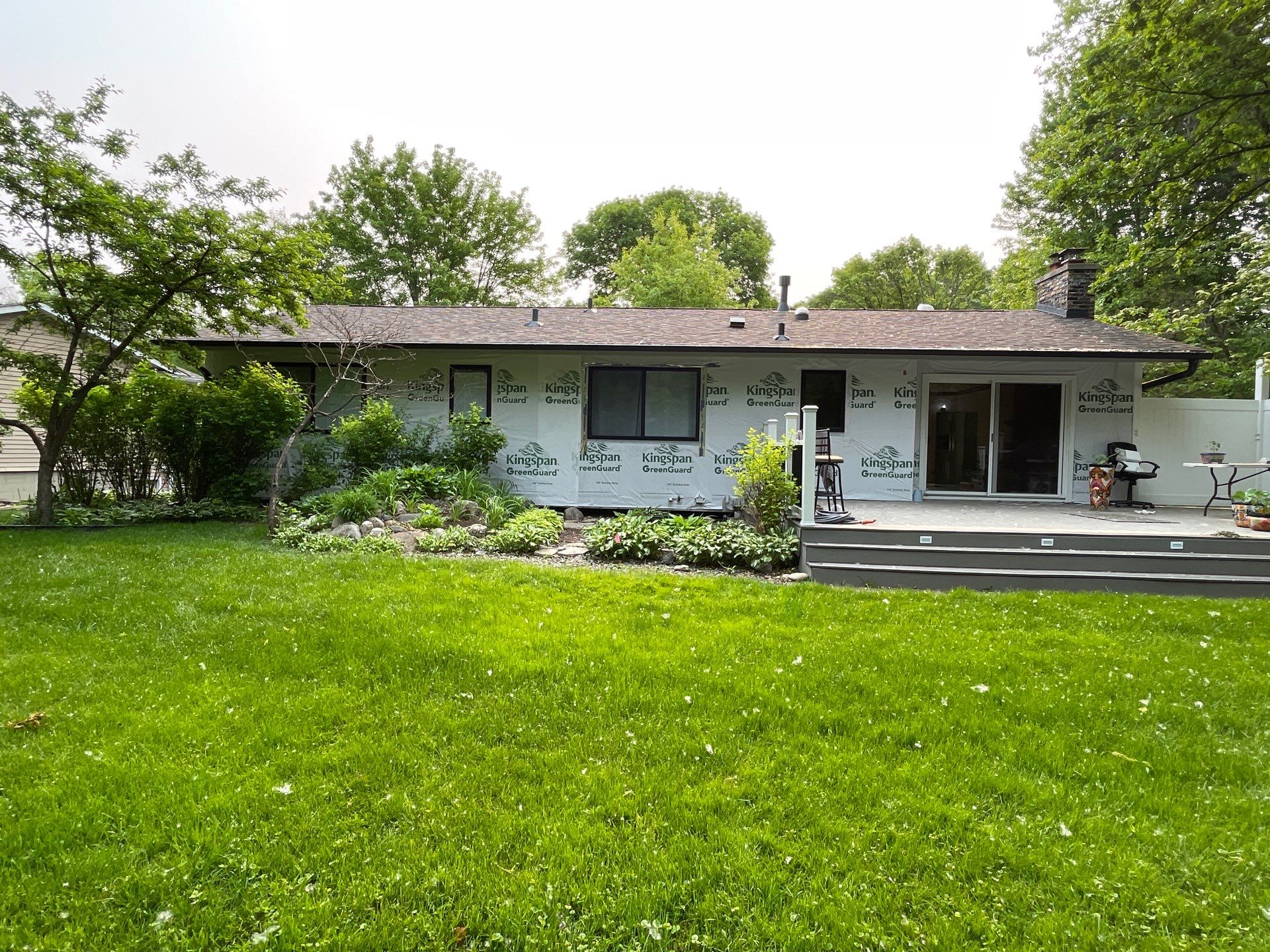Premium Exterior Remodel – Alside Charter Oak Siding, Hayfield Black Frame Windows, Edco Soffit & Fascia by First Impressions Exteriors