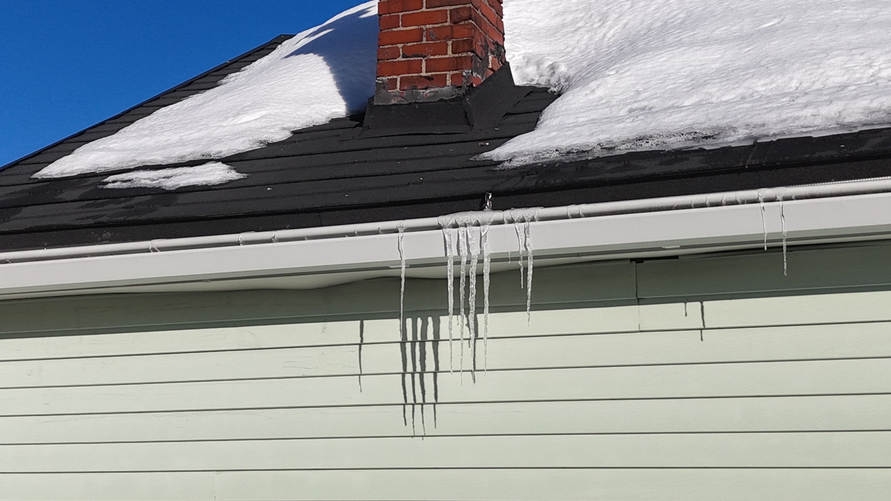 Vinyl Siding Repair & Replacement in Lowell, MA by Mighty Dog Roofing of Greater Middlesex County