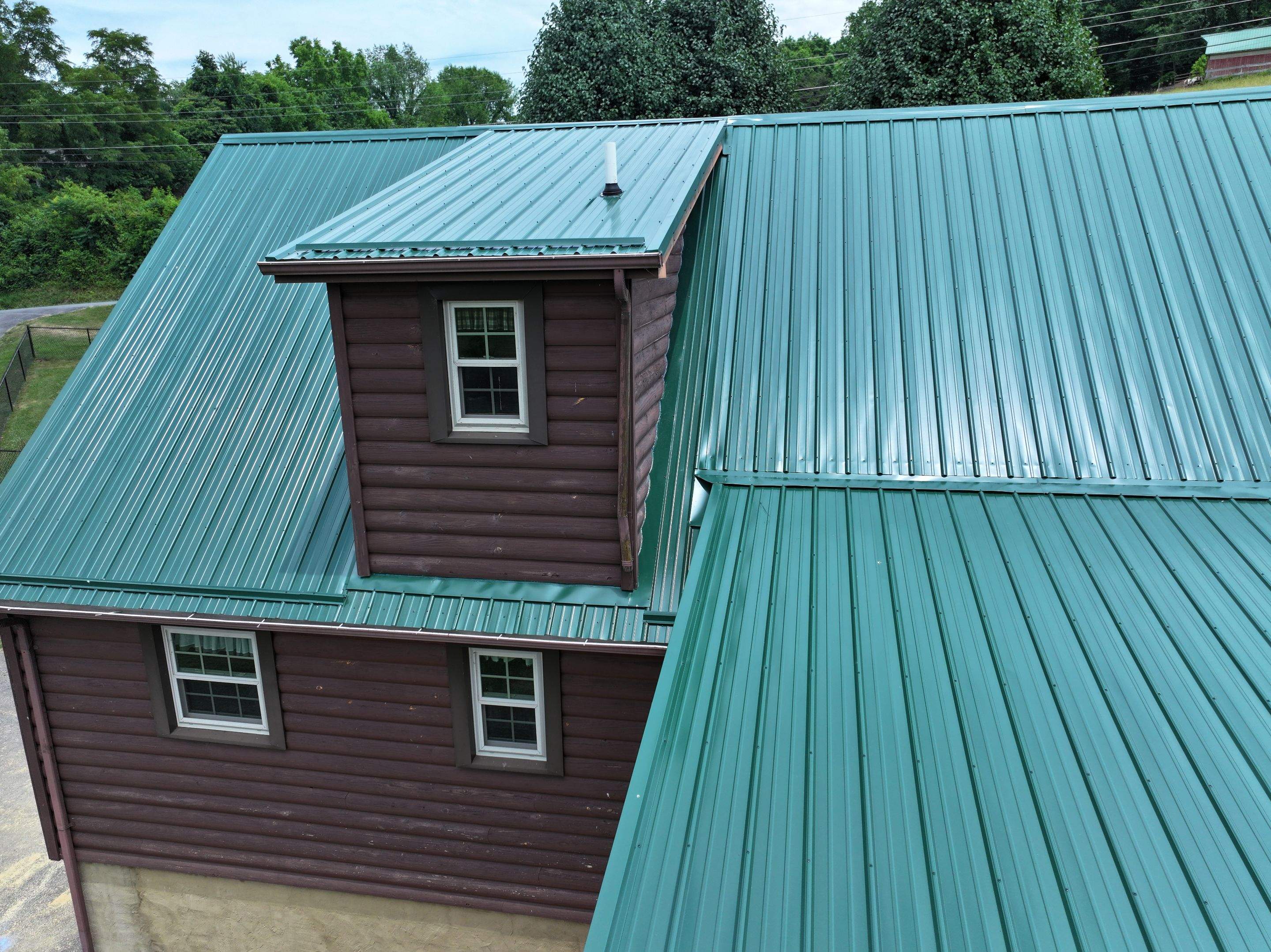 Paddle Creek Pet Ranch Cabin  by Omnia Roofing