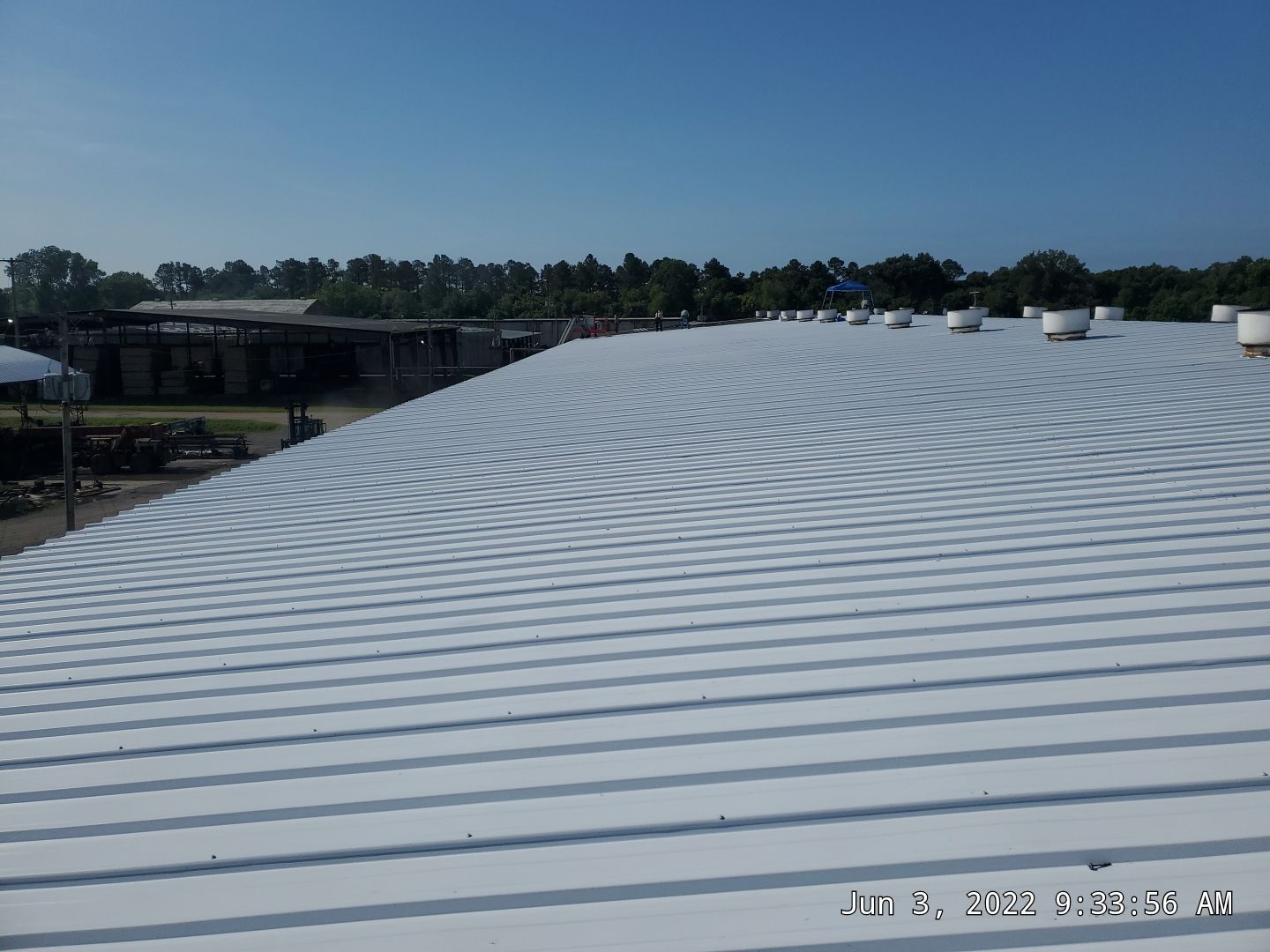 Commercial Roofing Installation using Aluminum Roofing panels by Hostetler Roofing