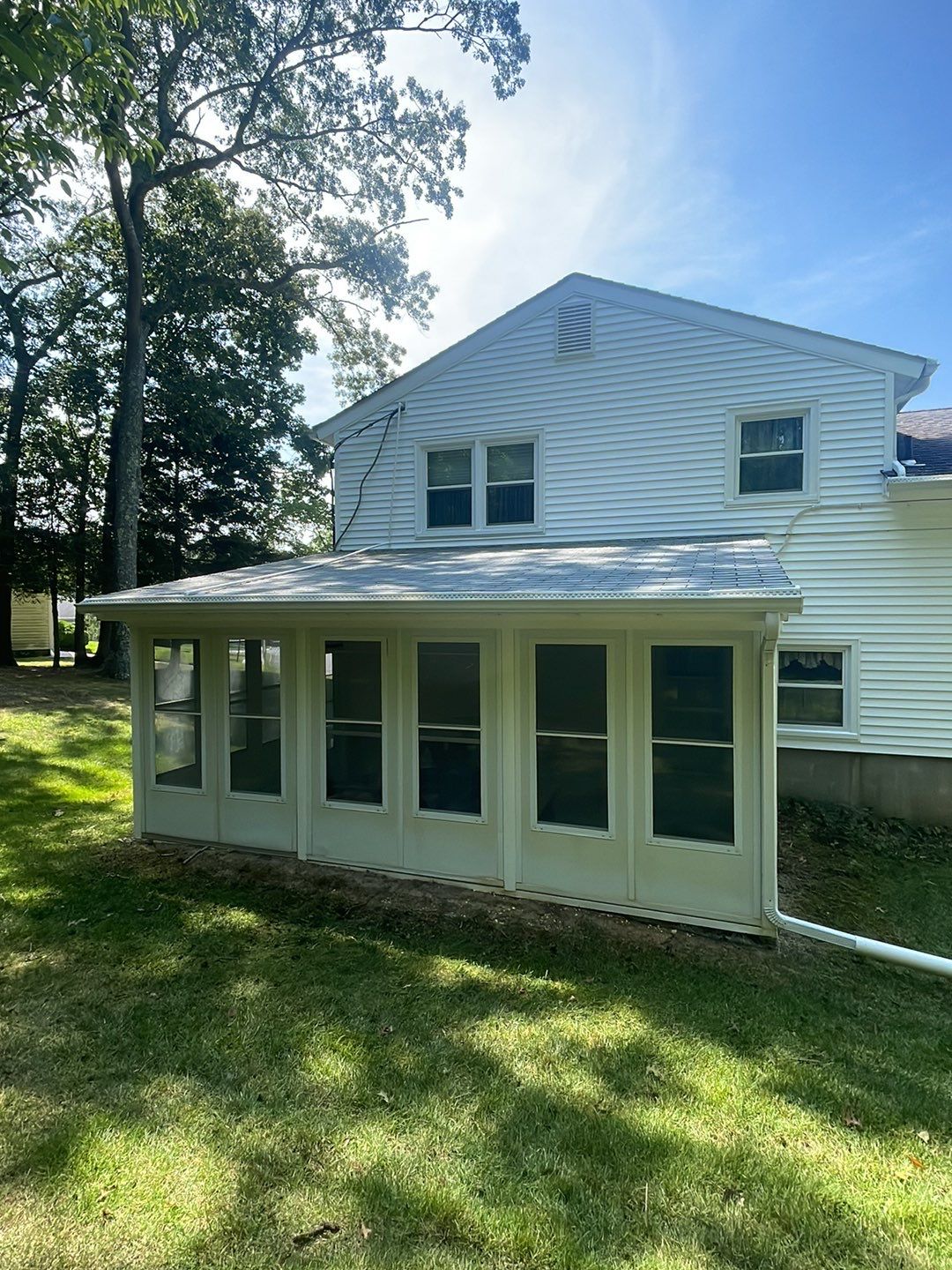 House Wash & Roof SoftWash (rear four season room) by SJ Exterior