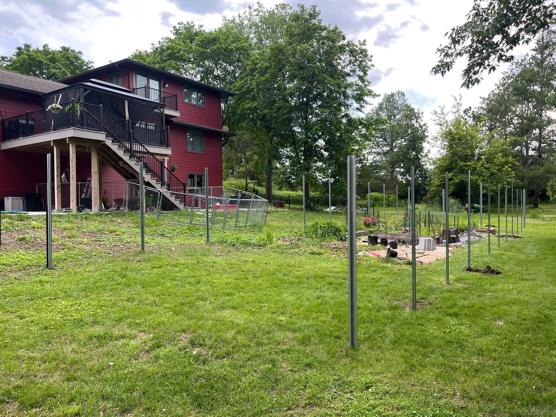 Stained Cedar Mahogany Garden Fence and Raised Bed Enclosure in Cedar Falls by Perfect Picket Fence and Stain