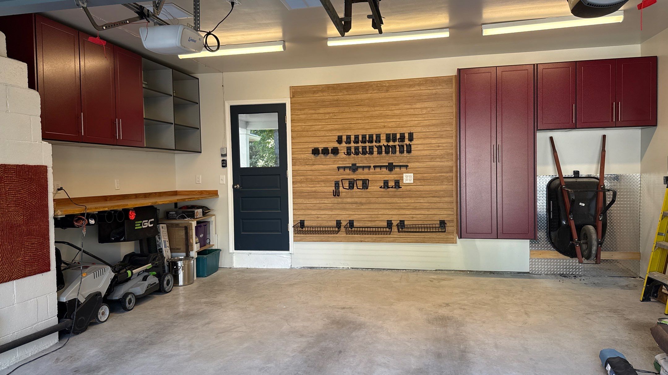 Custom Garage Storage and Slatwall Installation in Prairie Village by Banner Garage