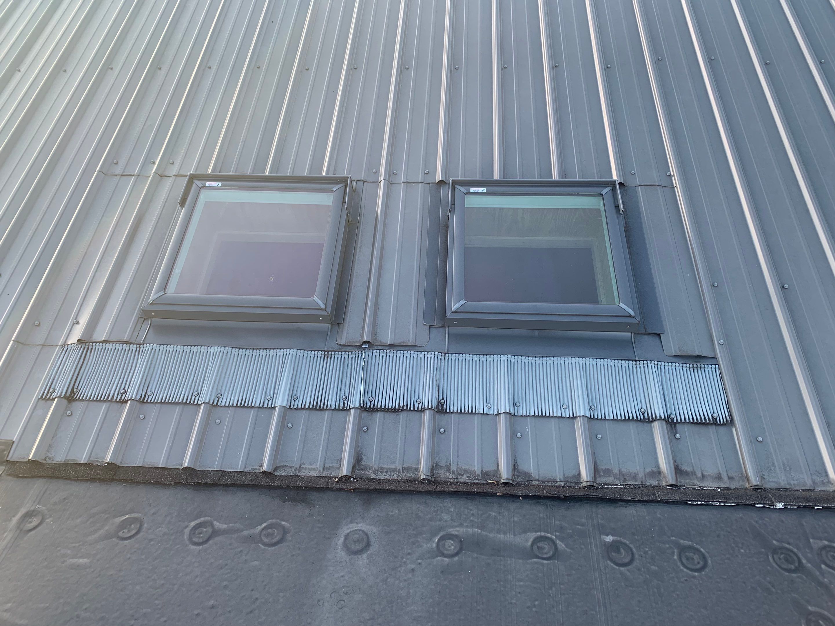 Rubber Roofing  on a residential sunroom by Secure Construction Company Inc