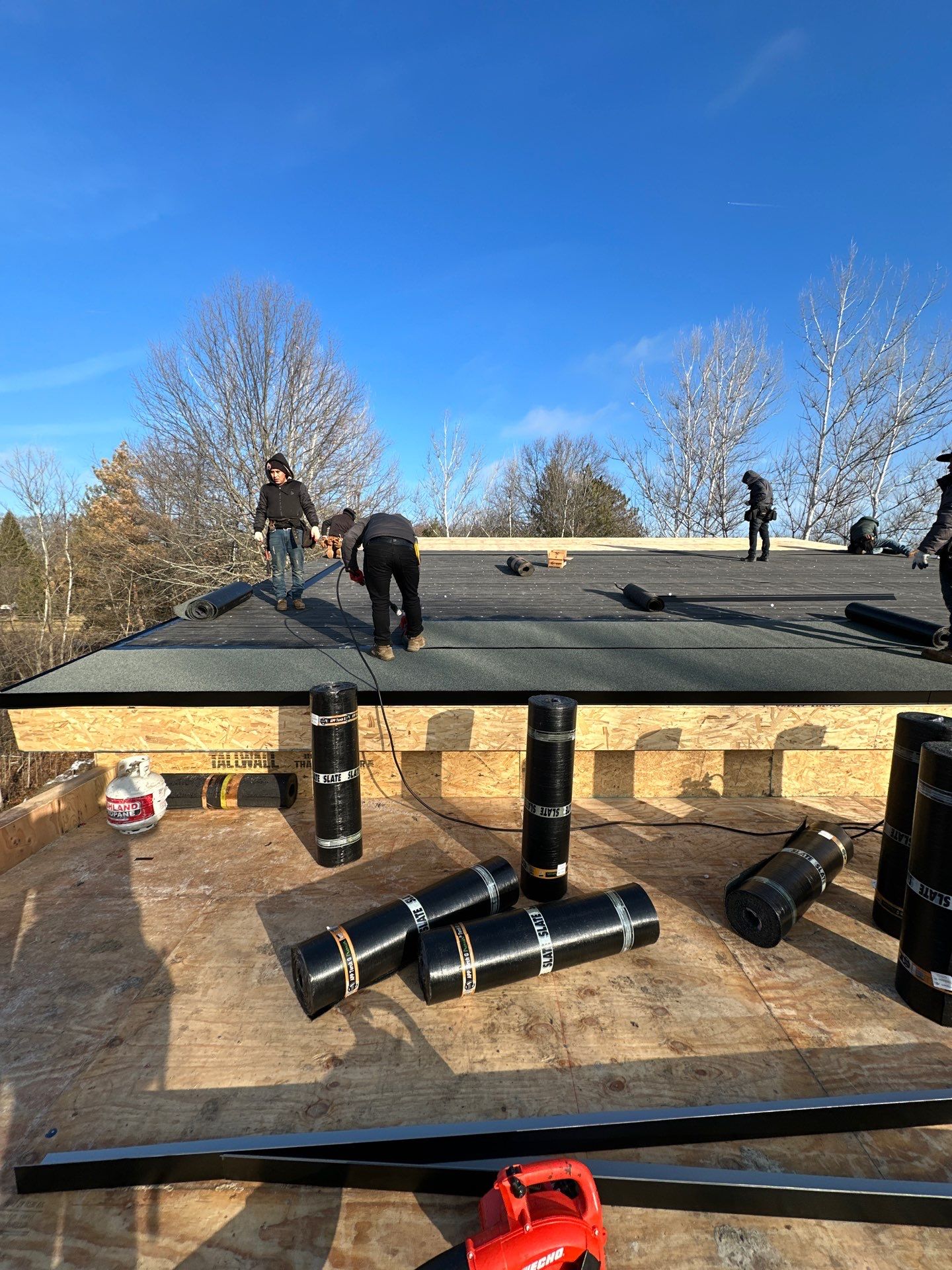 Residential Roofing Installation using Flat Roofing  by Perfect Exteriors Inc. 