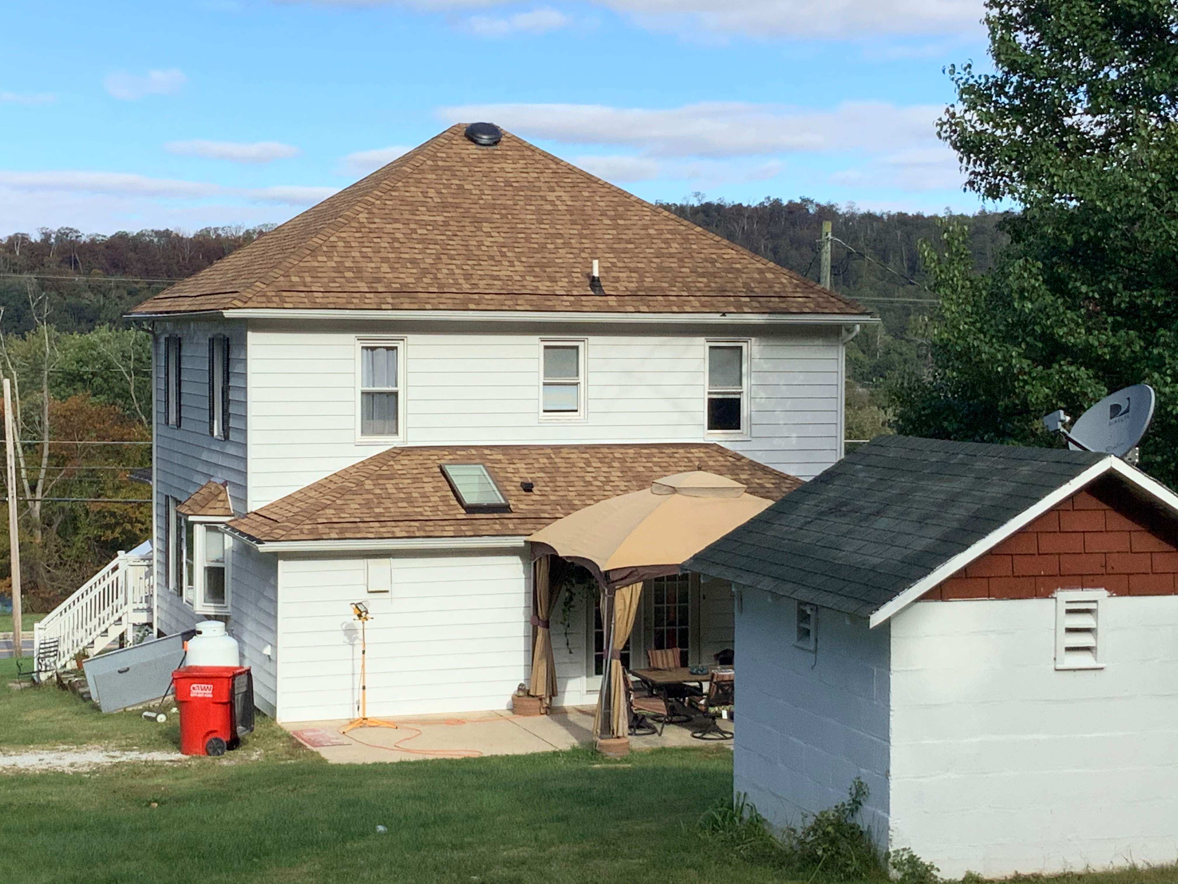 Residential Roofing Installation using Max Def Resawn Shake by Alpha Design Services