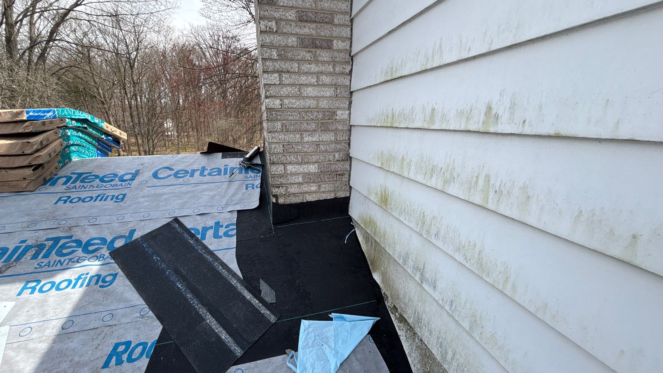 Roof Replacement using CertainTeed Landmark Moire Black by 180 Contractors