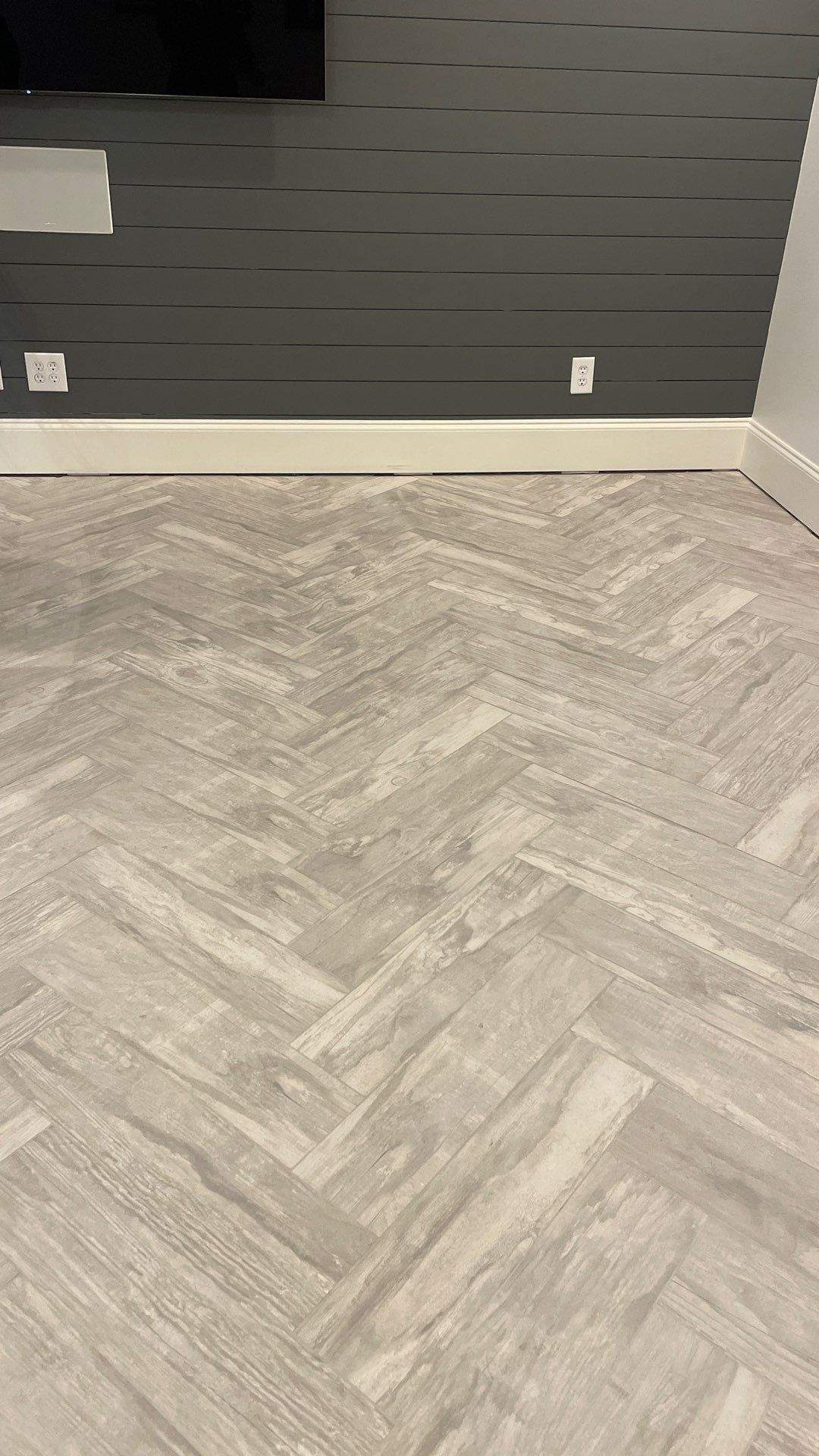 Herringbone basement floor by Footprints Bath and Tile of East Atlanta