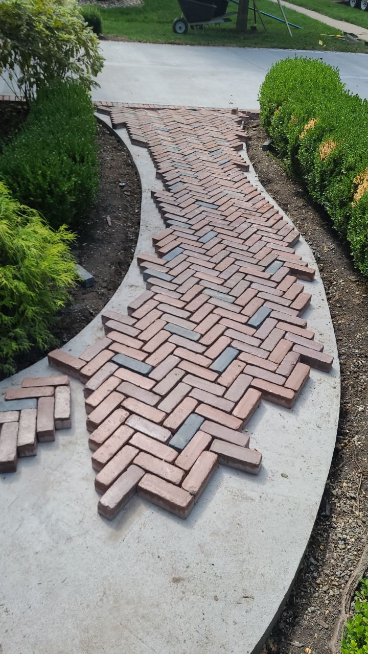 New Driveway and Sidewalk by LAND ESCAPES LLC