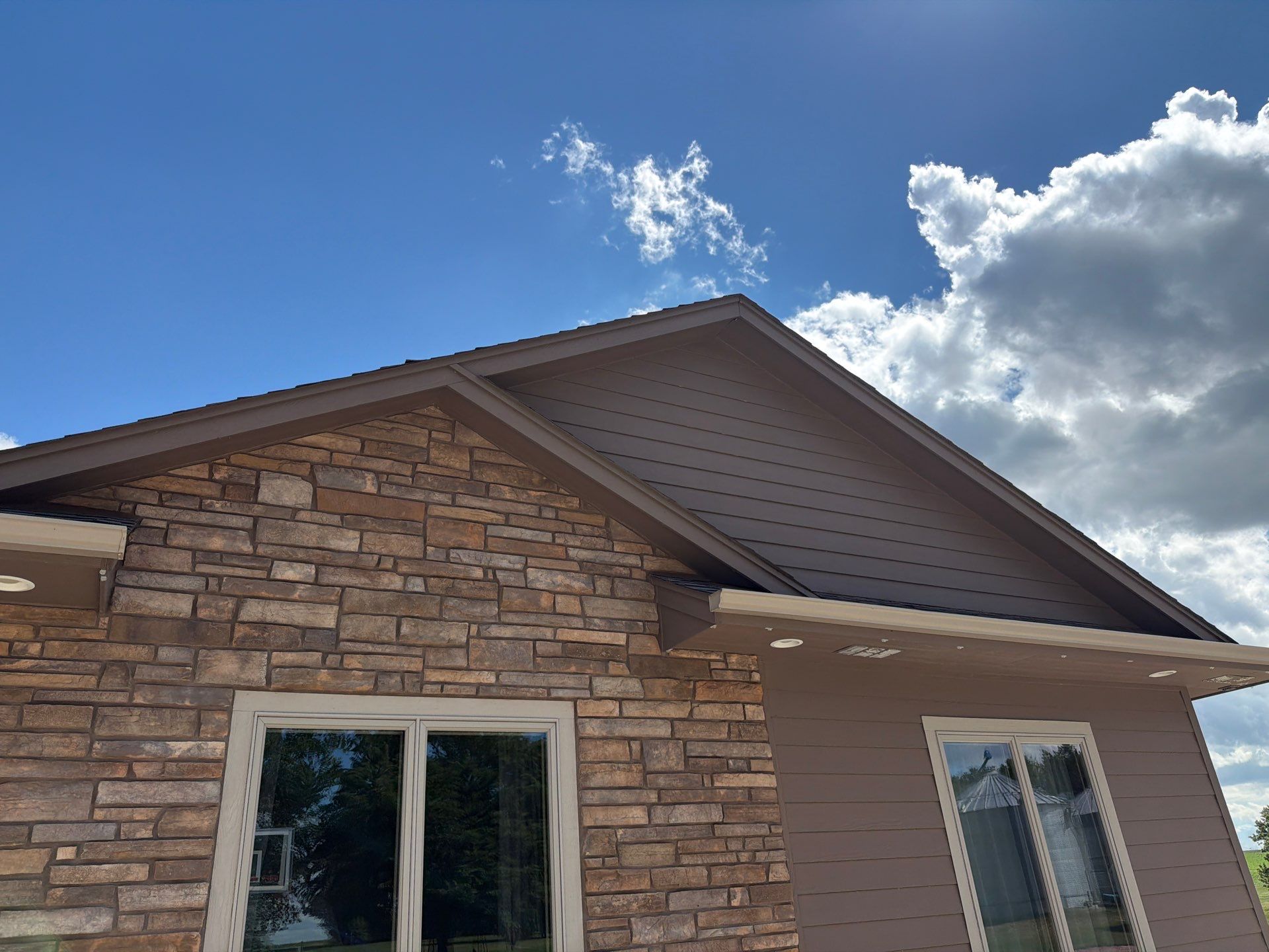 Full Exterior Siding Paint Restoration and Refresh in Garretson by Select Painting, Coatings & Garage Cabinets