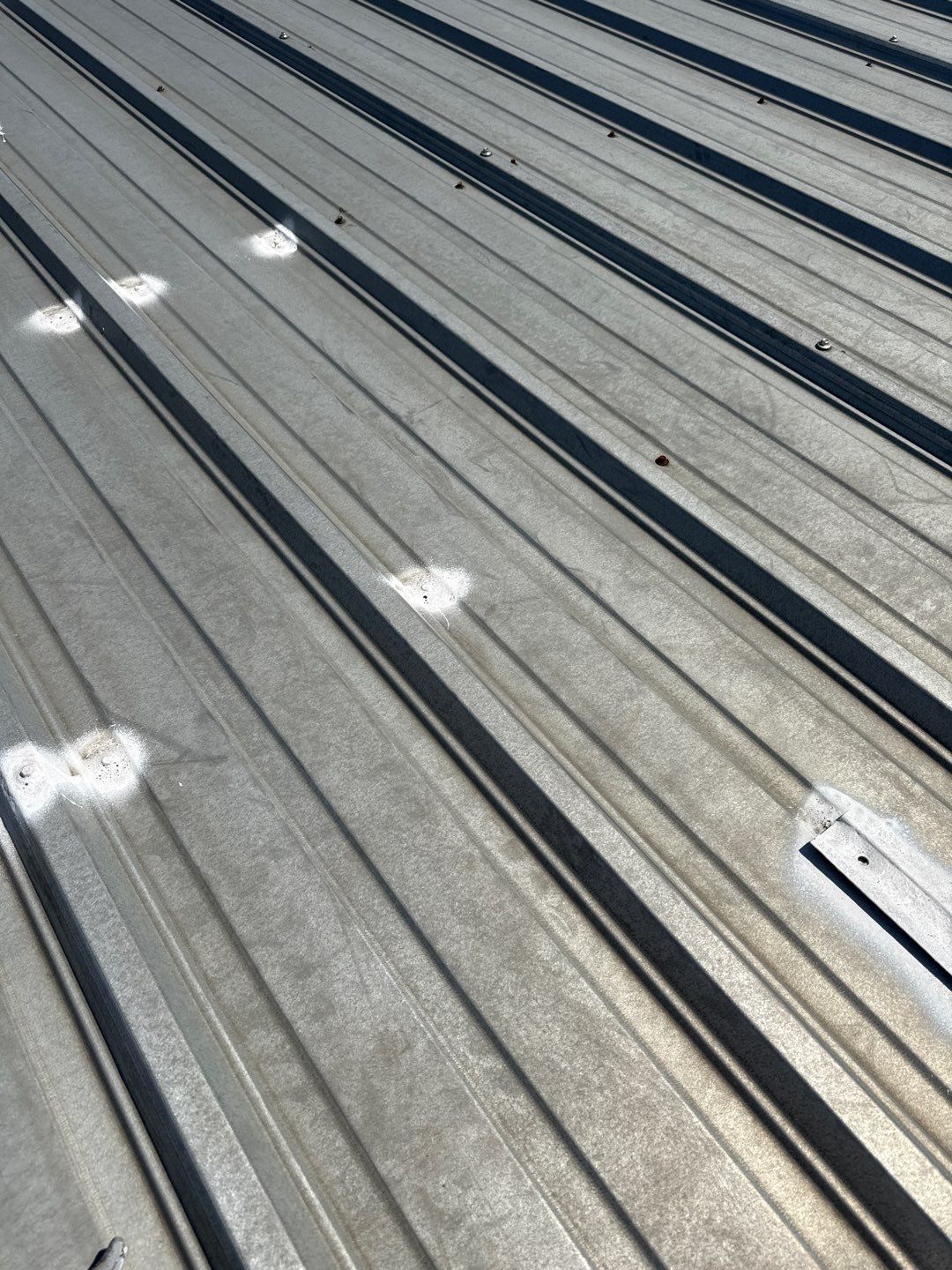Metal Roof Fastener Replacement and Seam Sealing in West Point, NE by Crows Roofing LLC