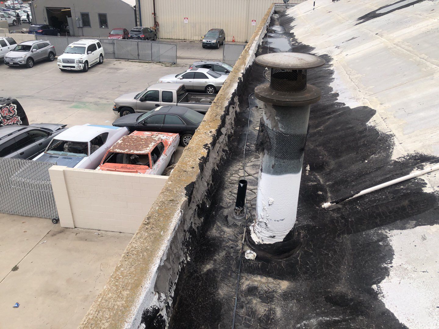 Spray foam and coatings using Conklin Benchmark/PUMA XL coatings and spray foam by Straight Edge Roofing Inc