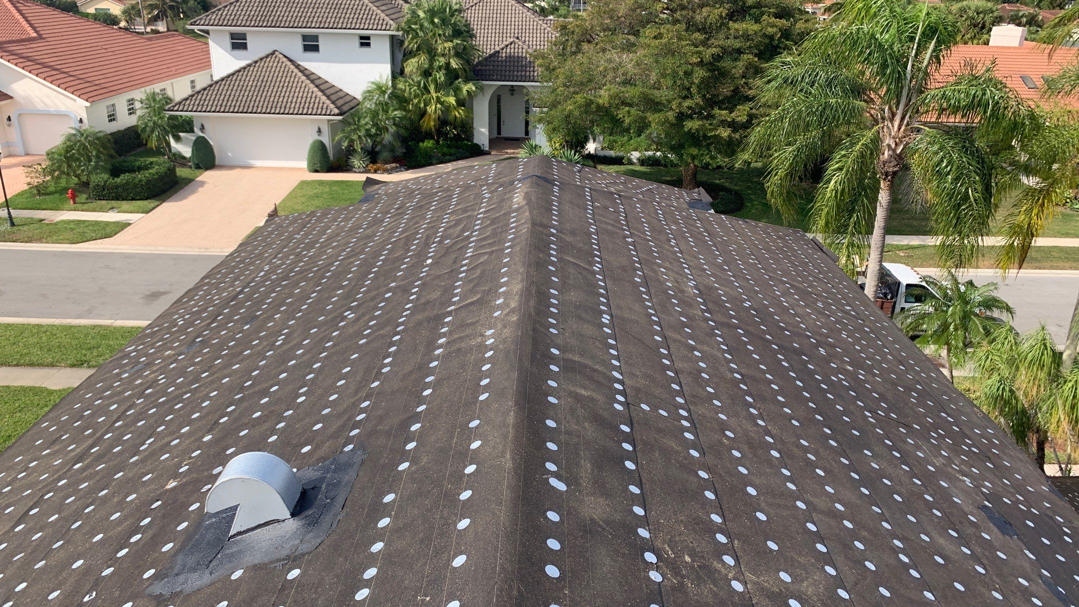Residential Roofing Installation using 1" Nail strip metal roof by BLUES BROTHERS ROOFING