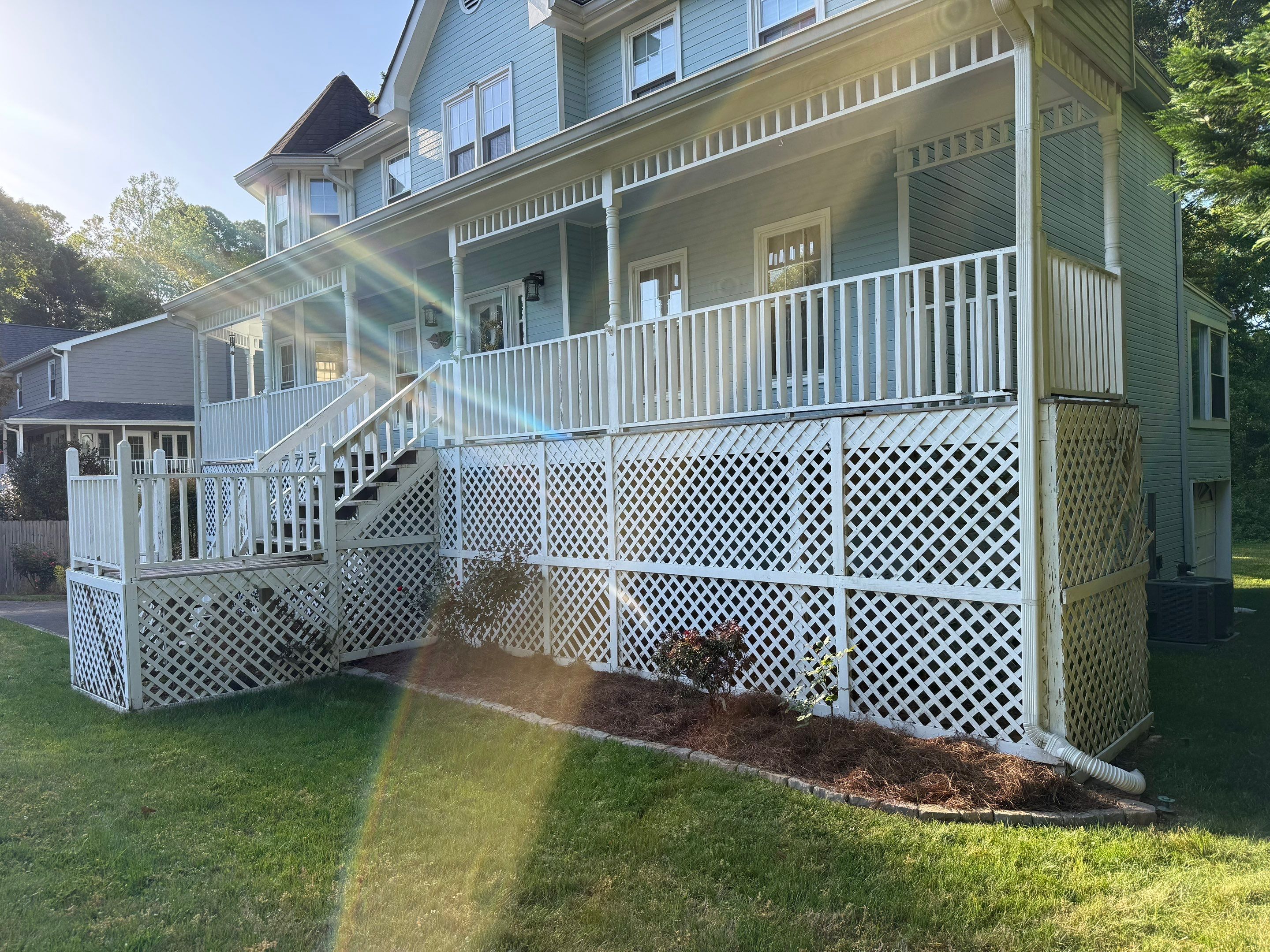 Marietta Porch Upgrade with Horizontal Pressure-Treated Wood Slats by Swift Home Renovations