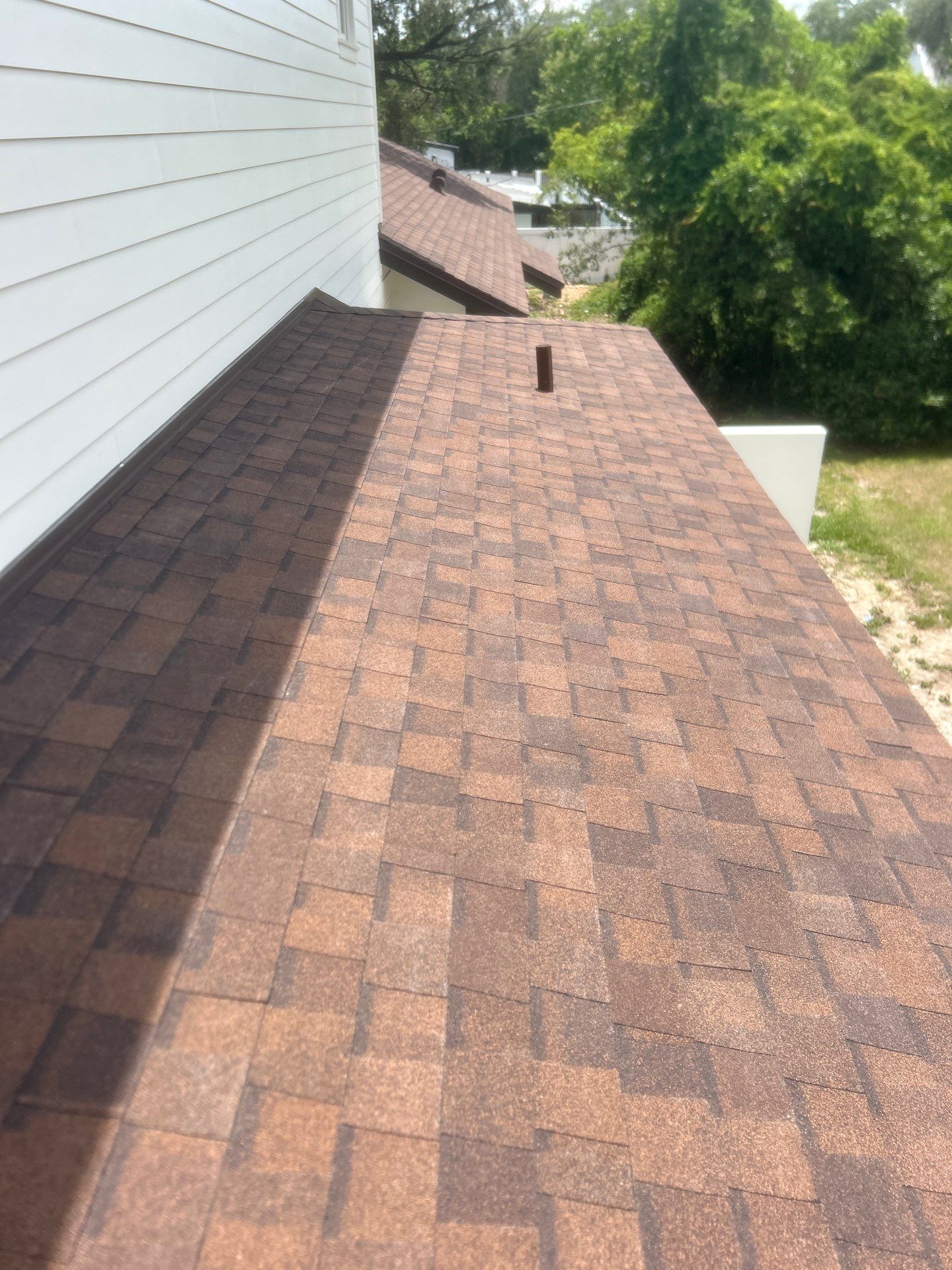 Residential Architectural Shingle Re-Roof Project in Winter Park by Tip Top Roofing Co., Inc.