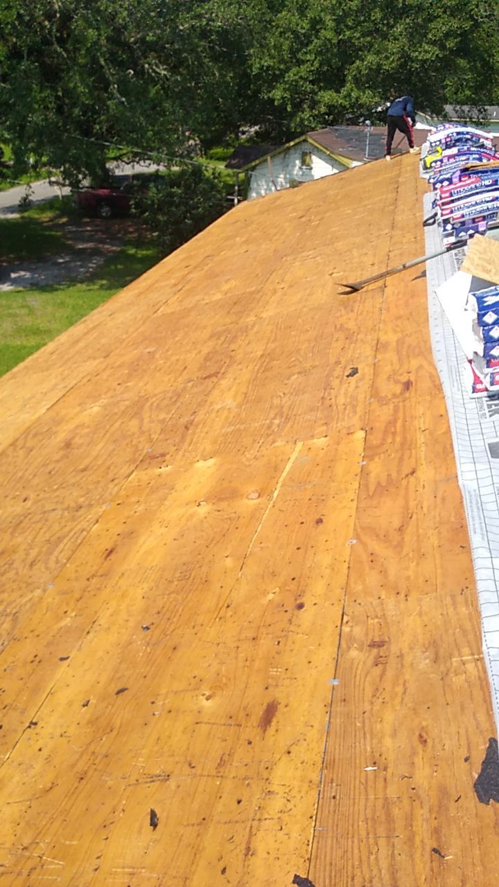 Residential Roofing Installation using Roof Replacement by American Roofing & Construction LLC