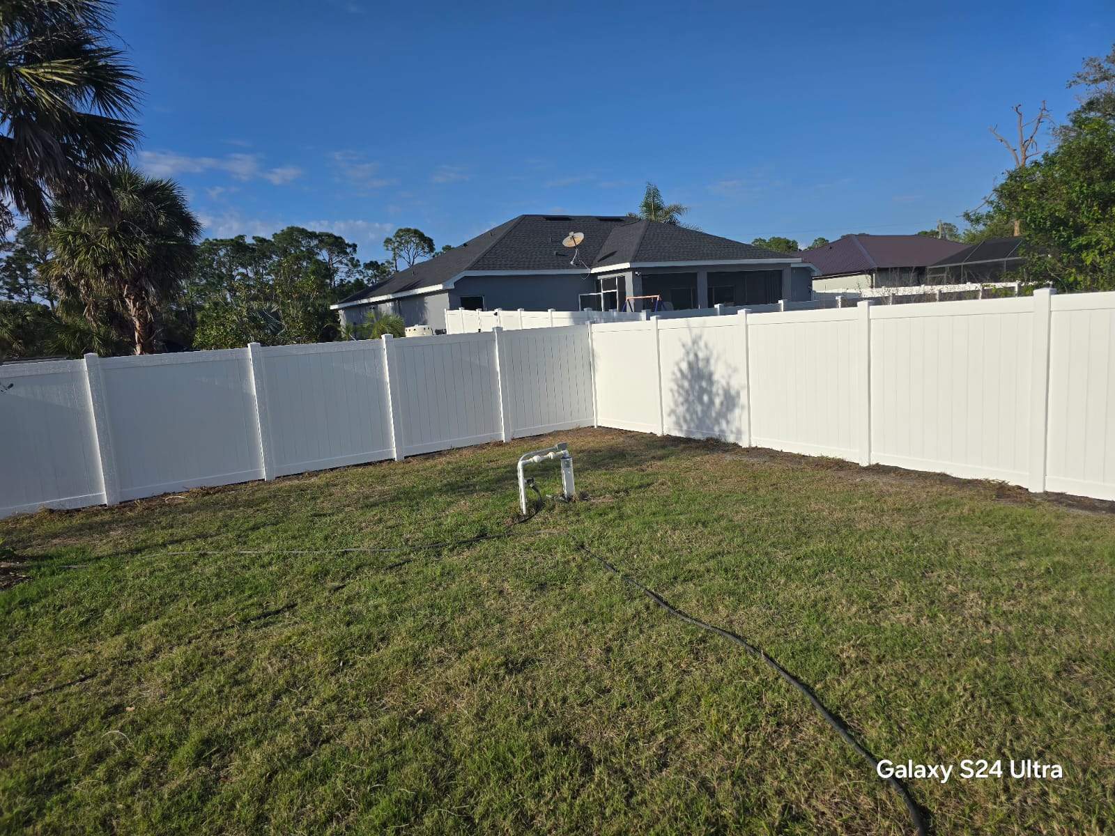 Residential White Vinyl Privacy Fence Installation in North Port by True Fence LLC
