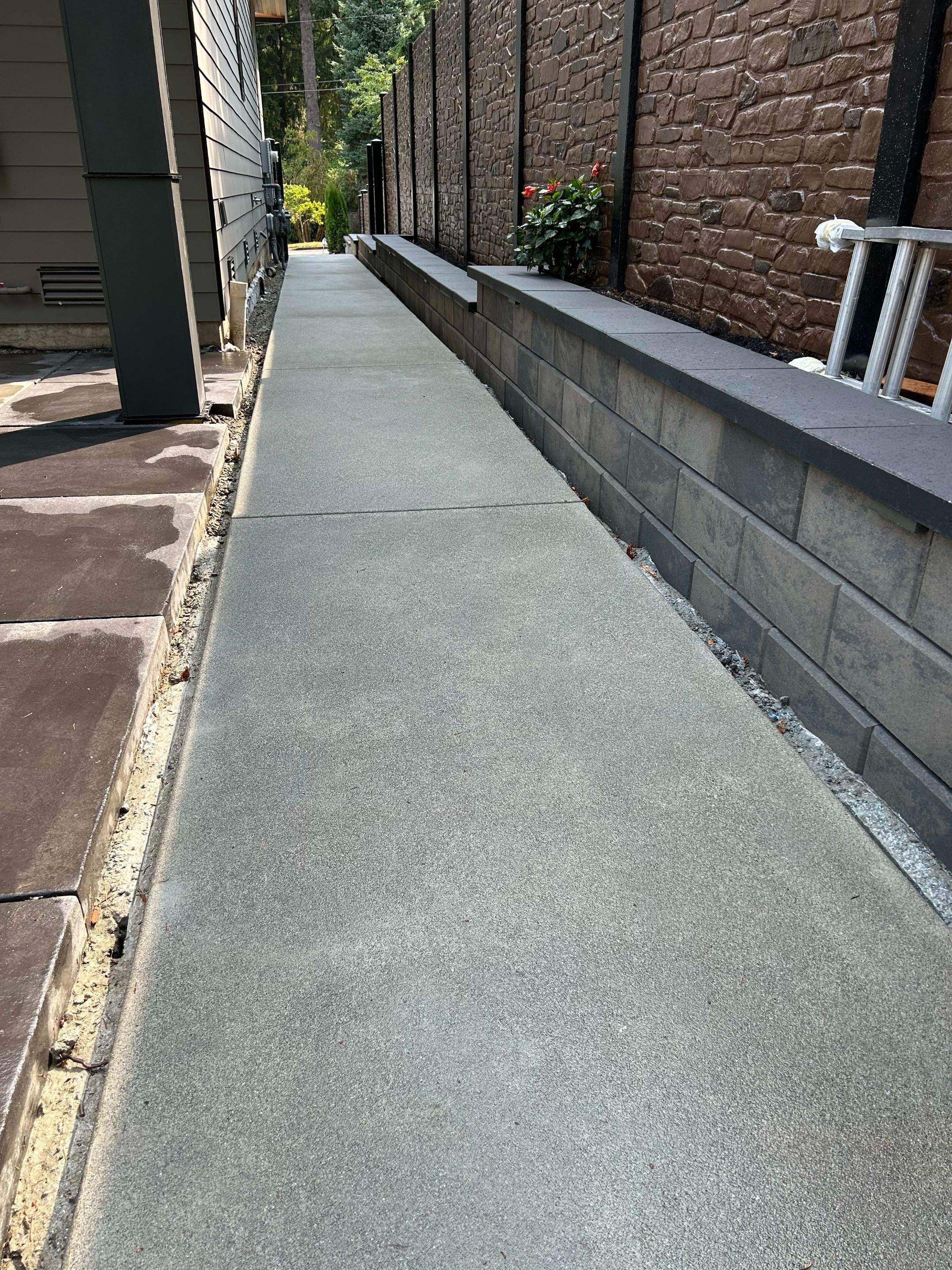 Bruce | Broom Finish Driveway, Concrete Project by Jireh Asphalt & Concrete Inc 