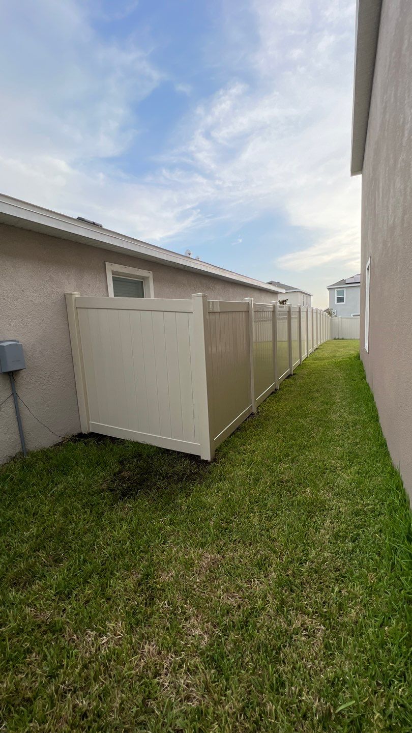 Tan Vinyl Privacy Fence Installation by Asap fence and gates, LLC