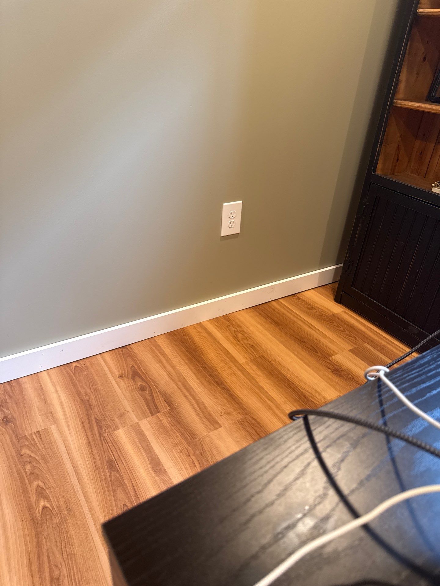 Lincoln Interior Renovation Featuring Sage Green Walls and Laminate Flooring by CompanyCam Sales Demo