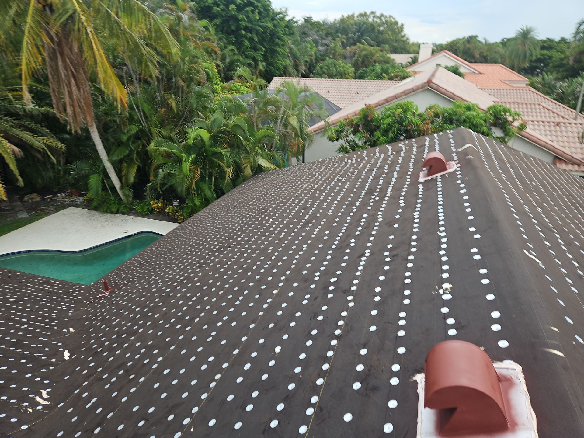 Residential Roofing Installation using 1" Nail strip metal roof by BLUES BROTHERS ROOFING