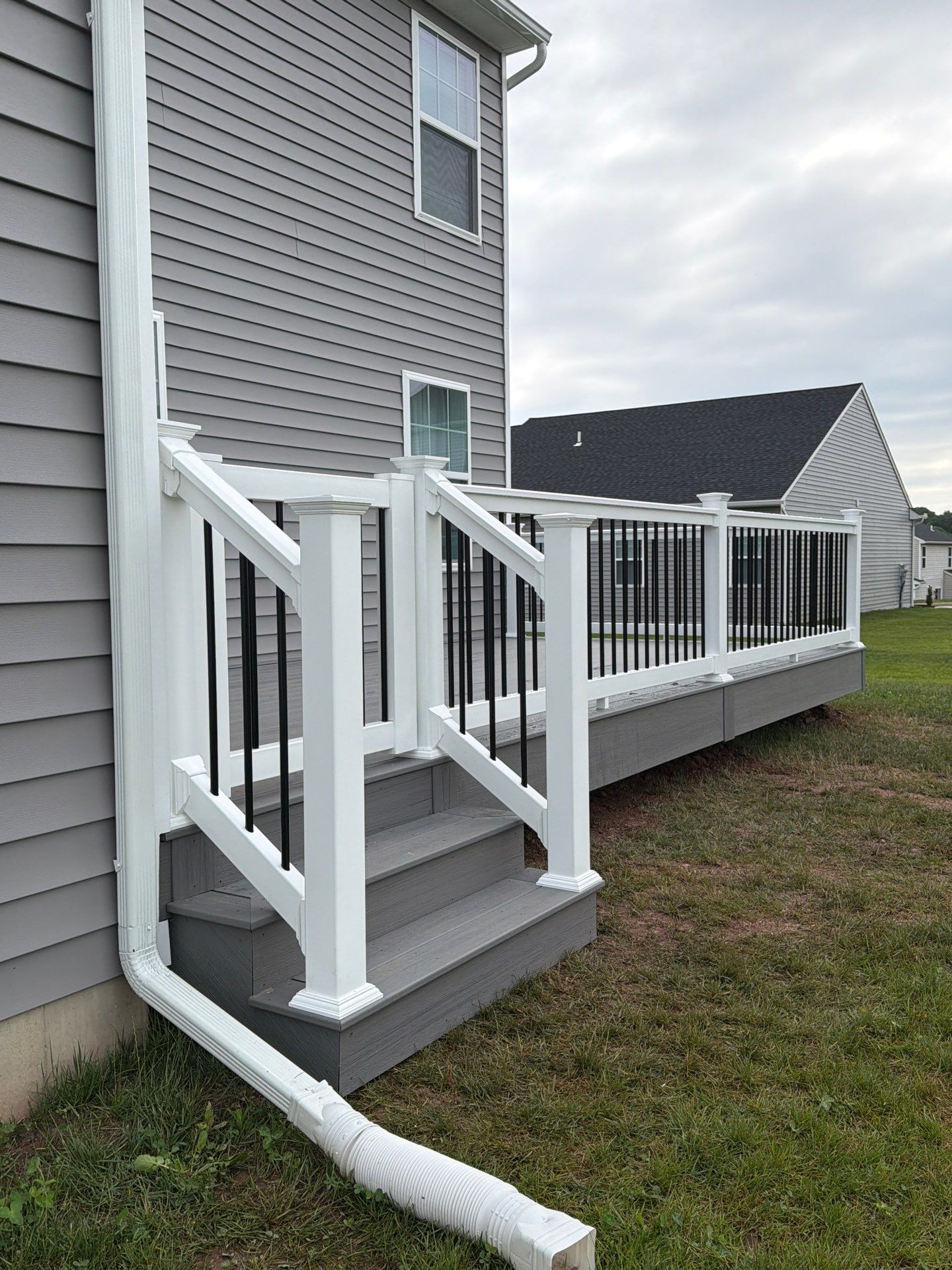 Custom Gray Composite Deck Installation in Duncannon by Esh Builders