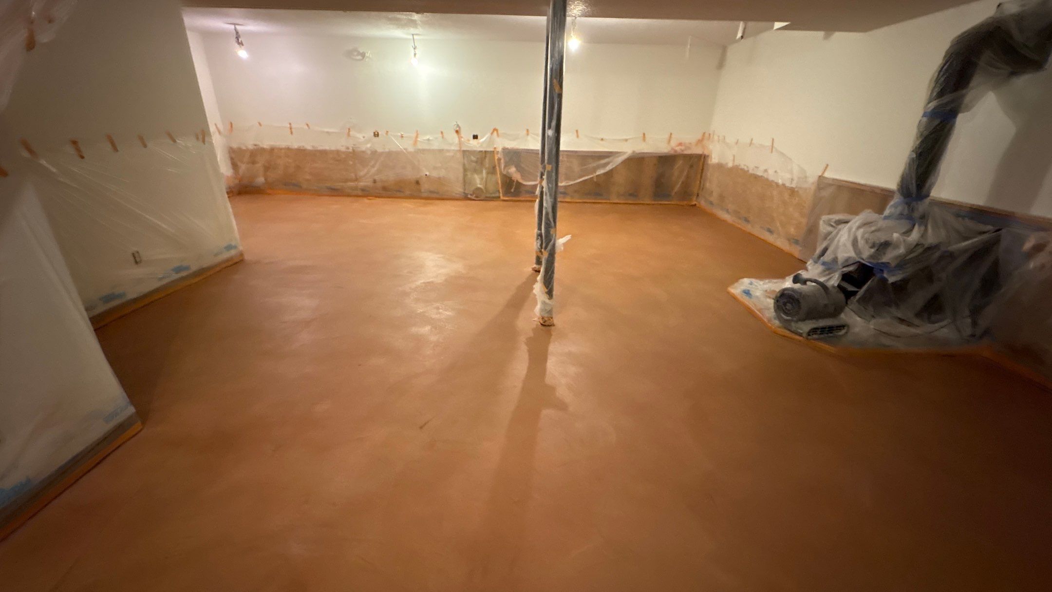 Basement Floor Remodel with Haven Reno KC by Big Red Decorative Concrete, LLC