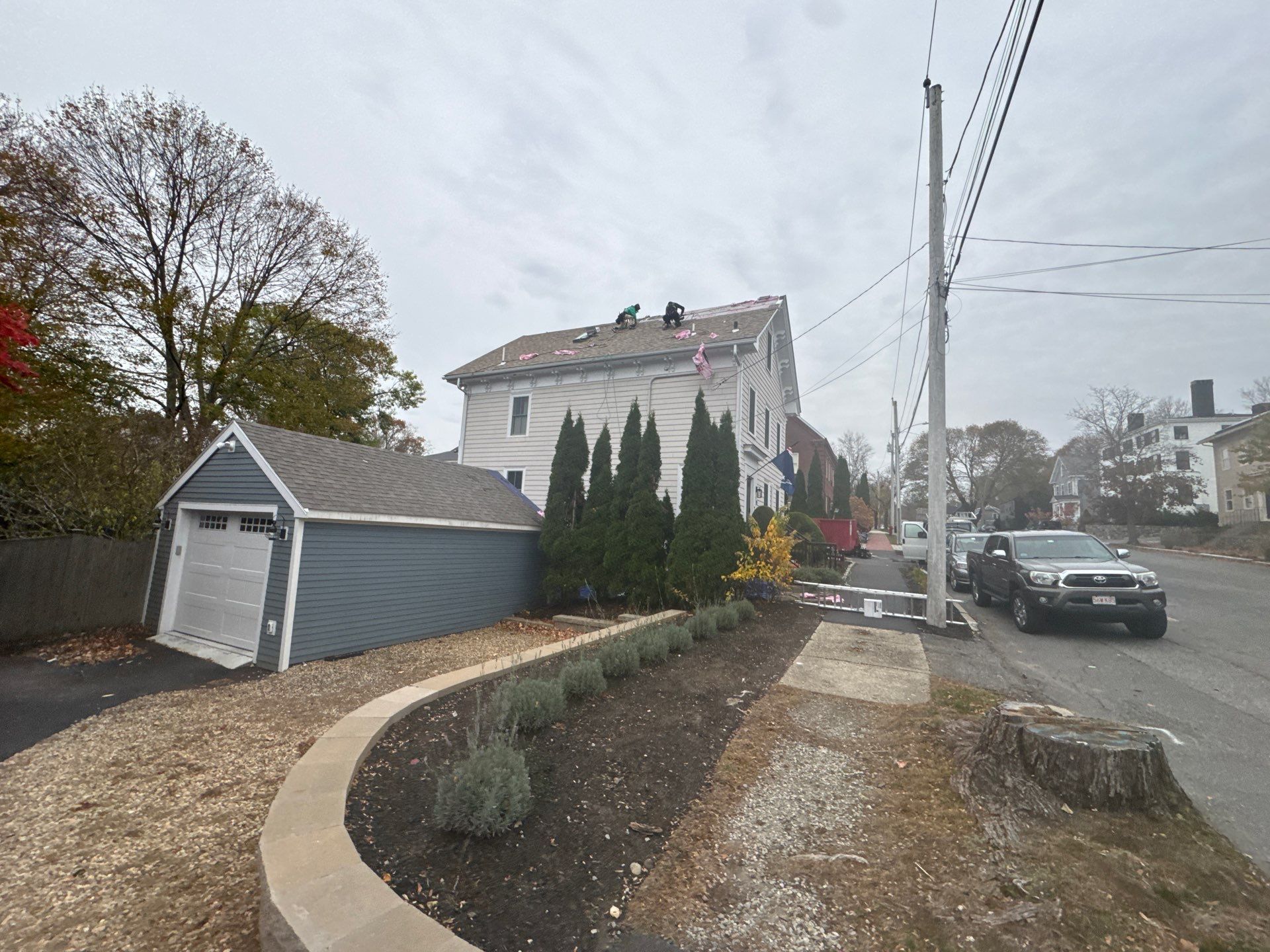 Newburyport Complete Roof Replacement with Solar Venting Skylight by Mighty Dog Roofing of Greater Middlesex County