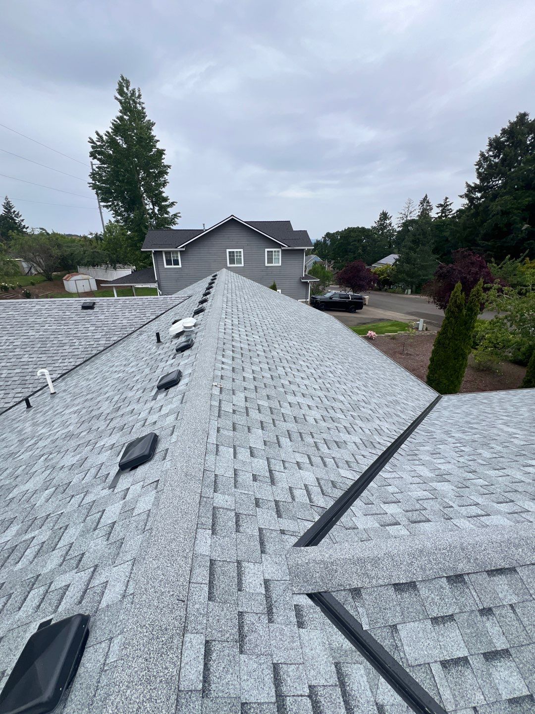 Residential Roofing Installation using IKO Cambridge (Color: Dual Grey) by Orezona Building & Roofing Company, Inc.