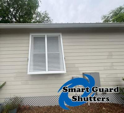 Hurricane rated Bahama Shutters in Traffic White