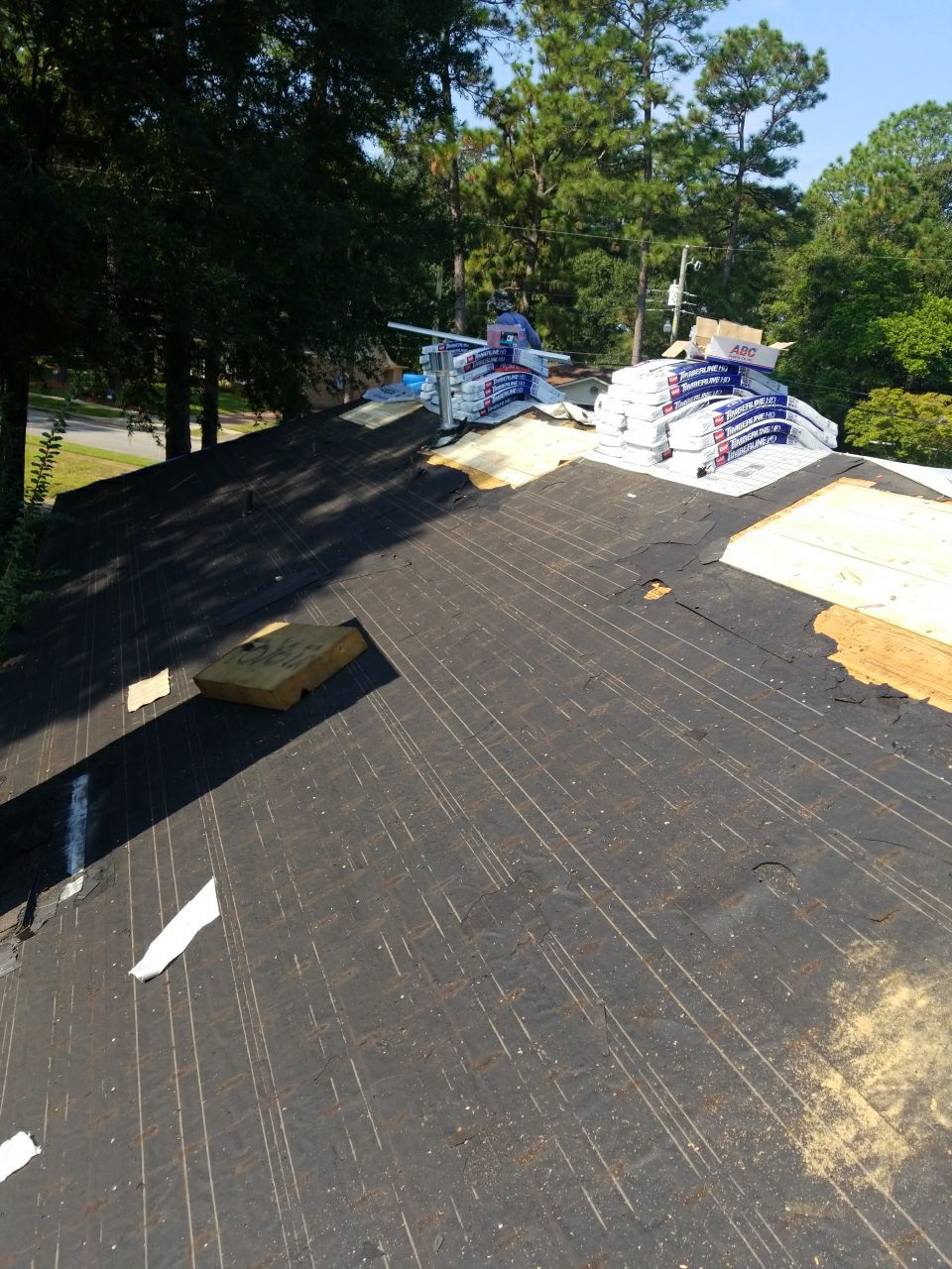 Residential Roofing Installation using Roof Replacement by American Roofing & Construction LLC