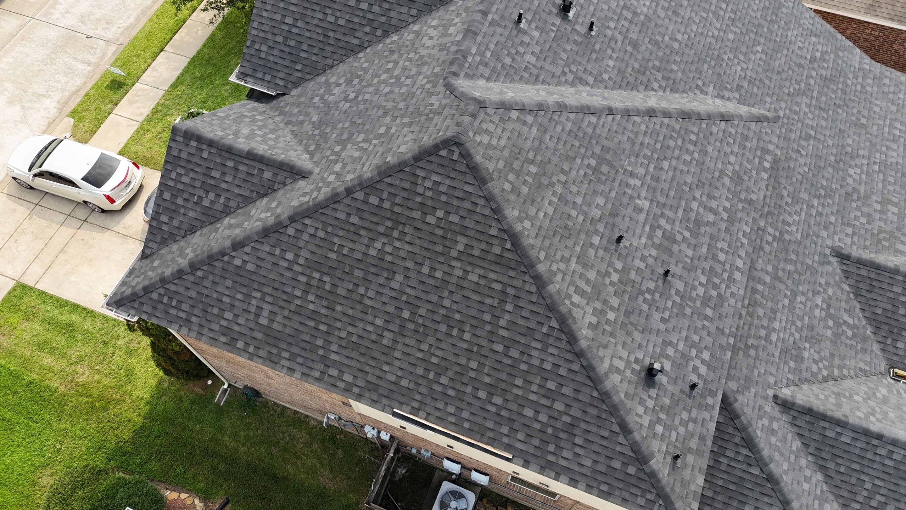 Residential Roofing Installation using IKO Dynasty by Core Four Roofing