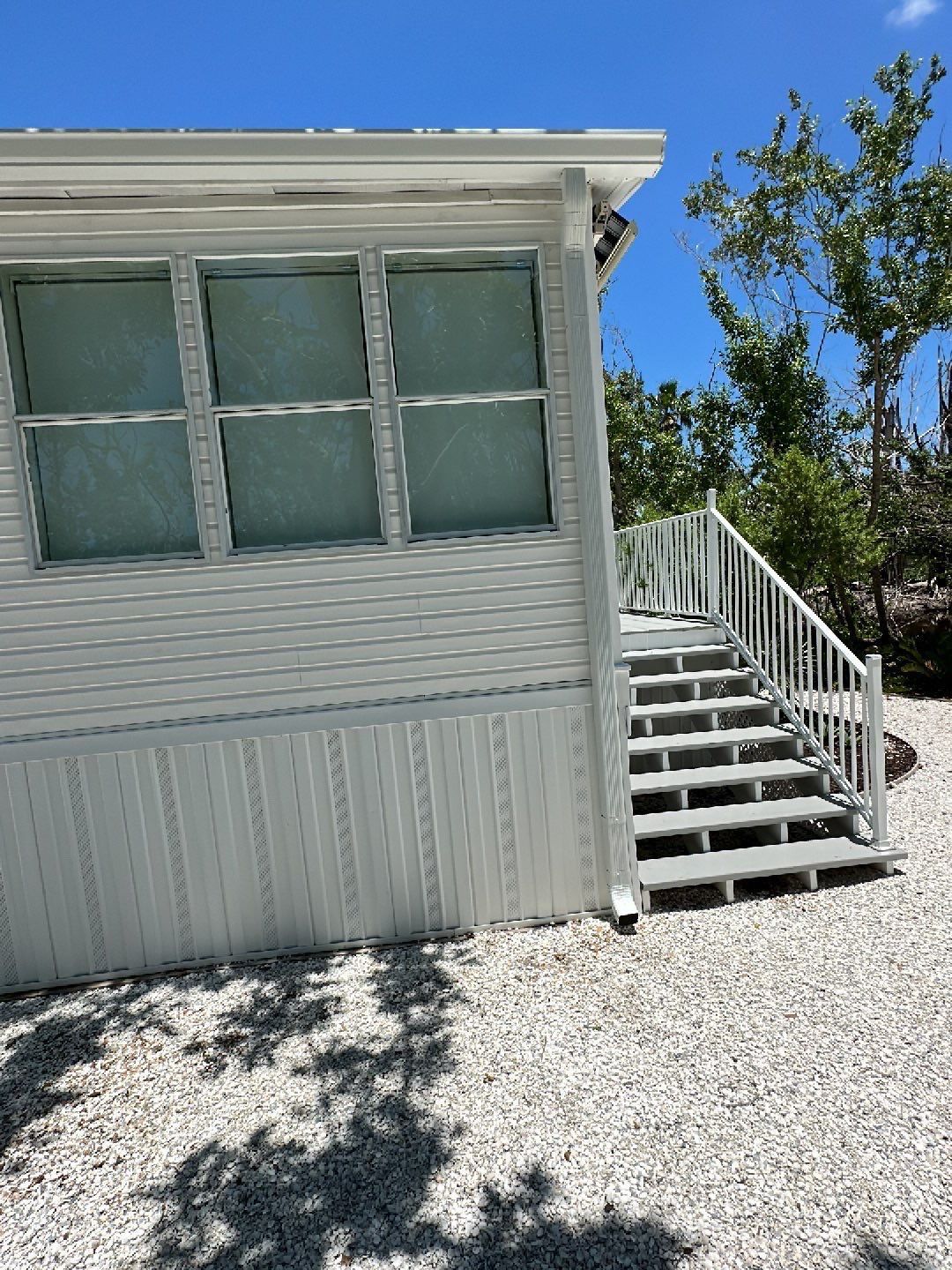 Downspout Installation using Charcoal Grey in Sanibel FL by Gutter Professors