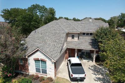 Red brick/white stone with IKO Cornerstone