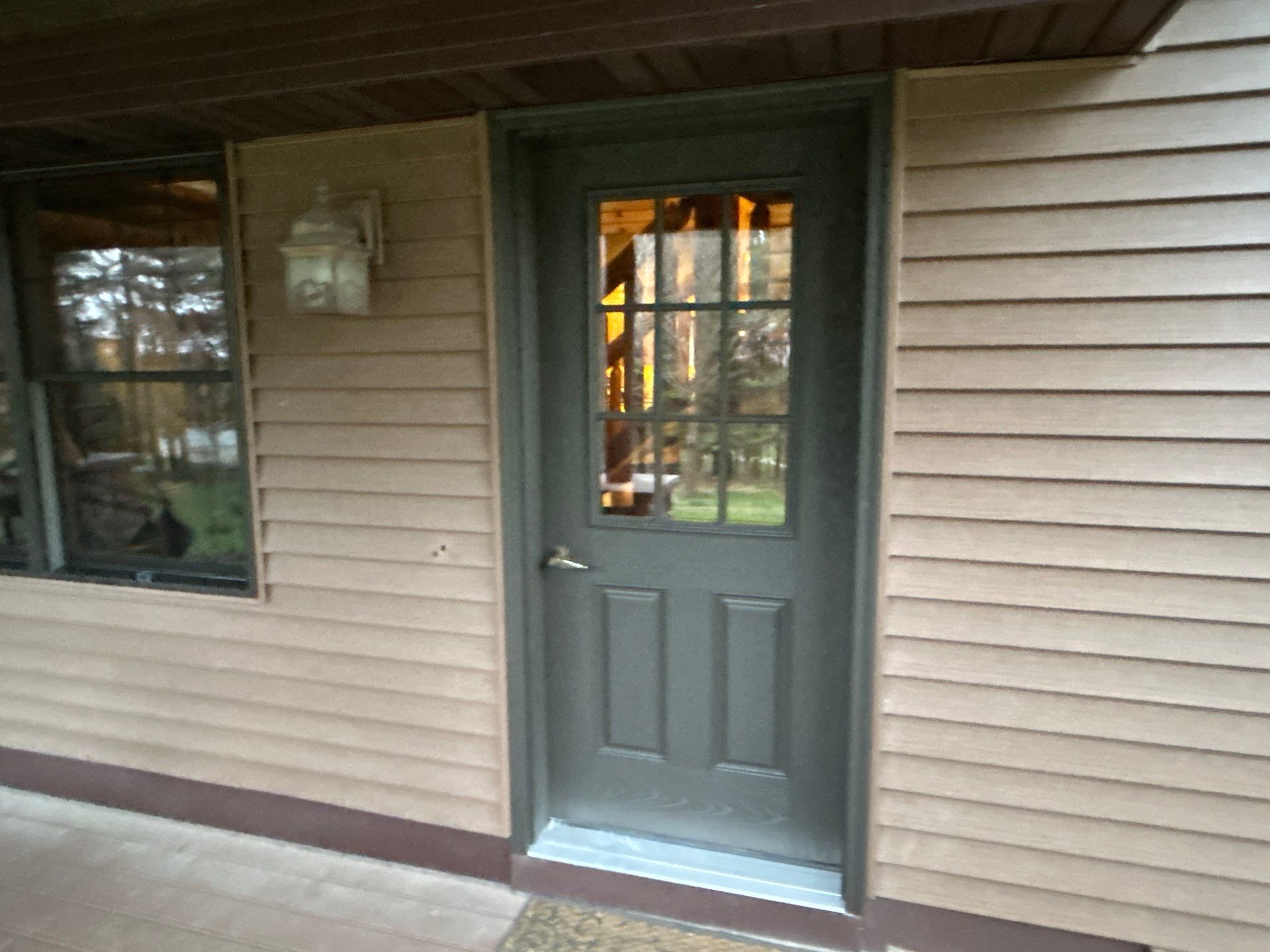 Pella Window installation using Pella Lifestyle wood/Aluminum window by United Windows and Siding LLC