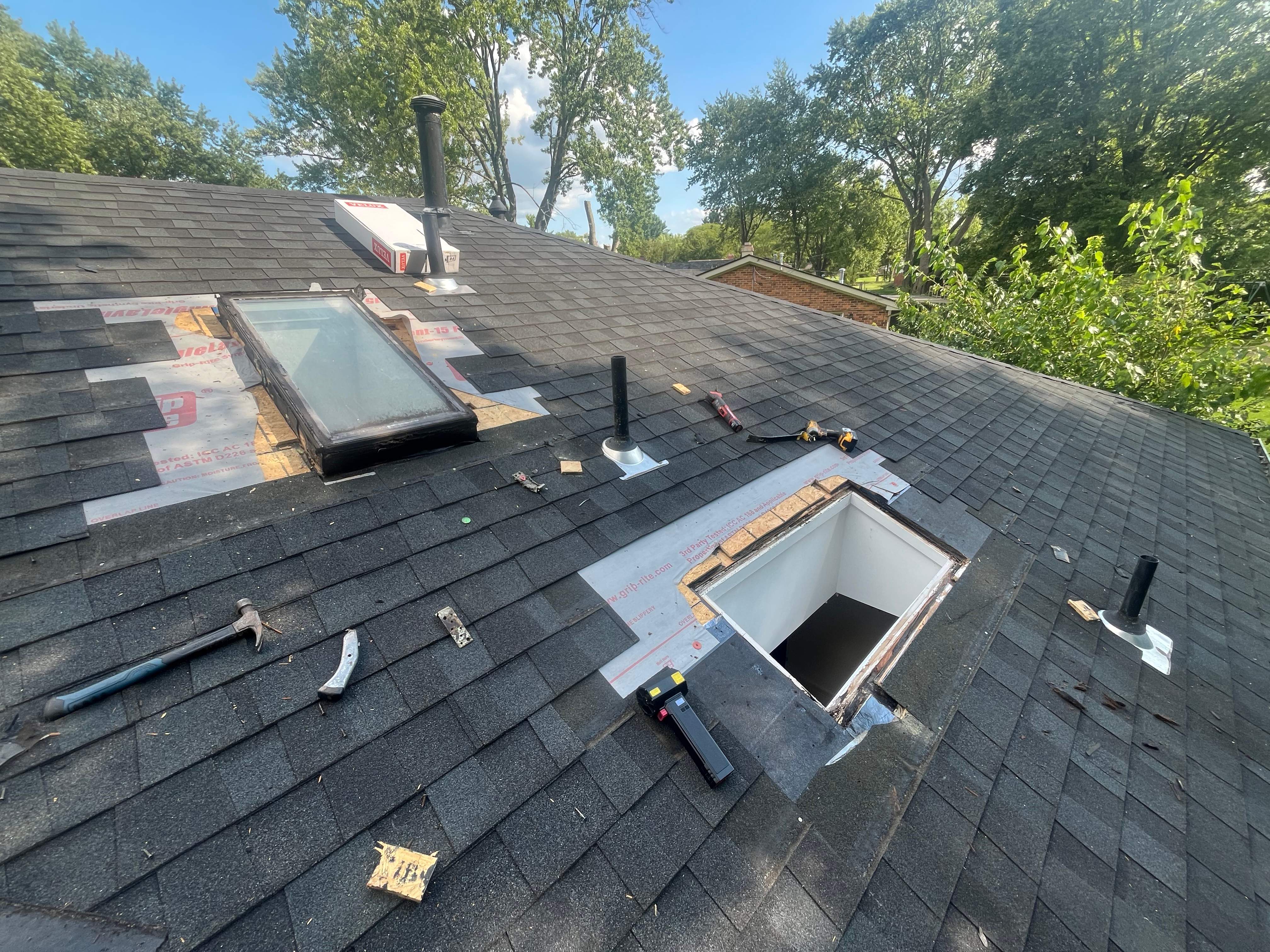 Dayton Skylight Replacement and Shingle Repair for Leaking Roof by Level Up Roofing and Restoration Services LLC
