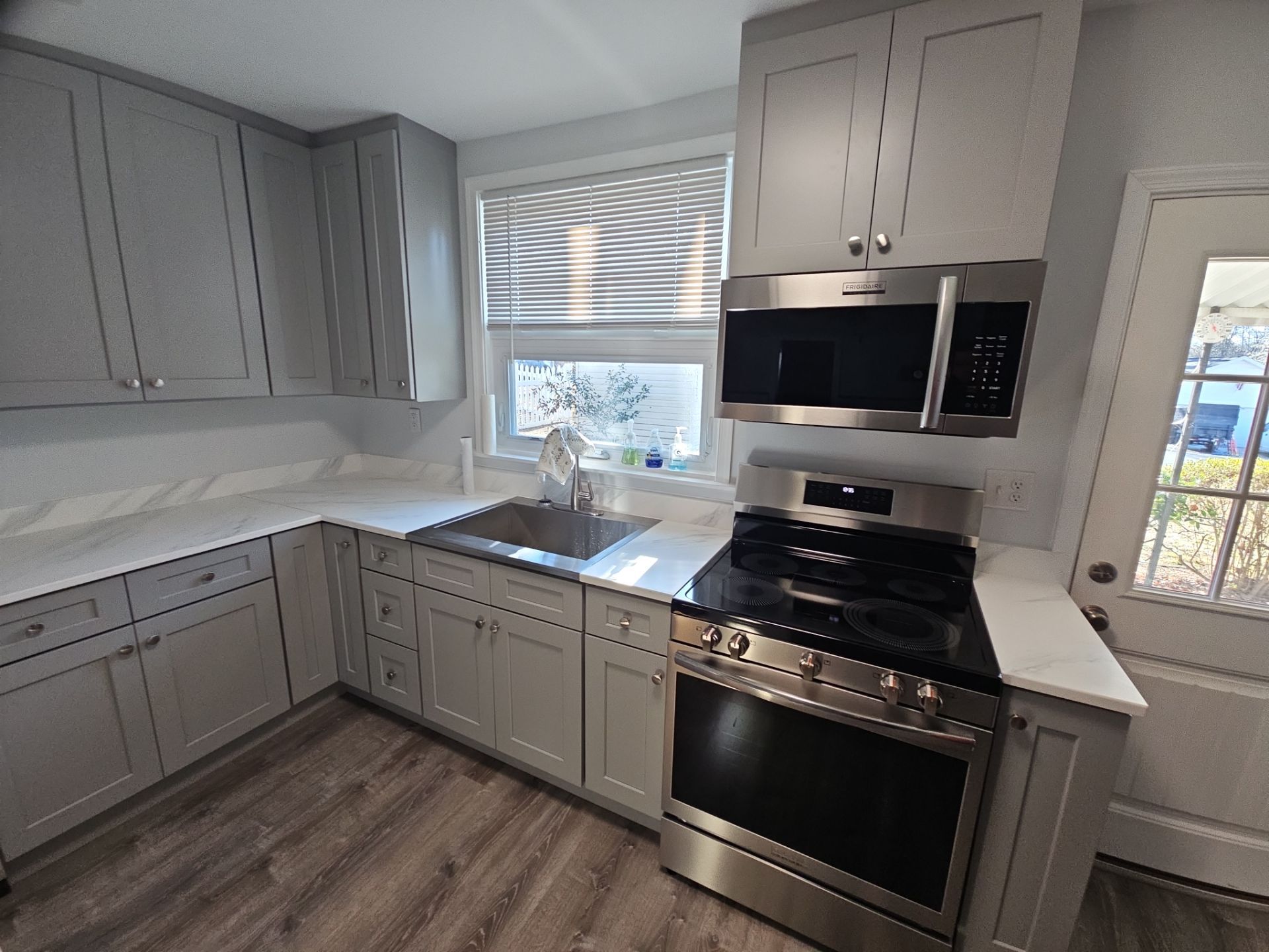 Kitchen and living area remodel by Window Depot of Annapolis