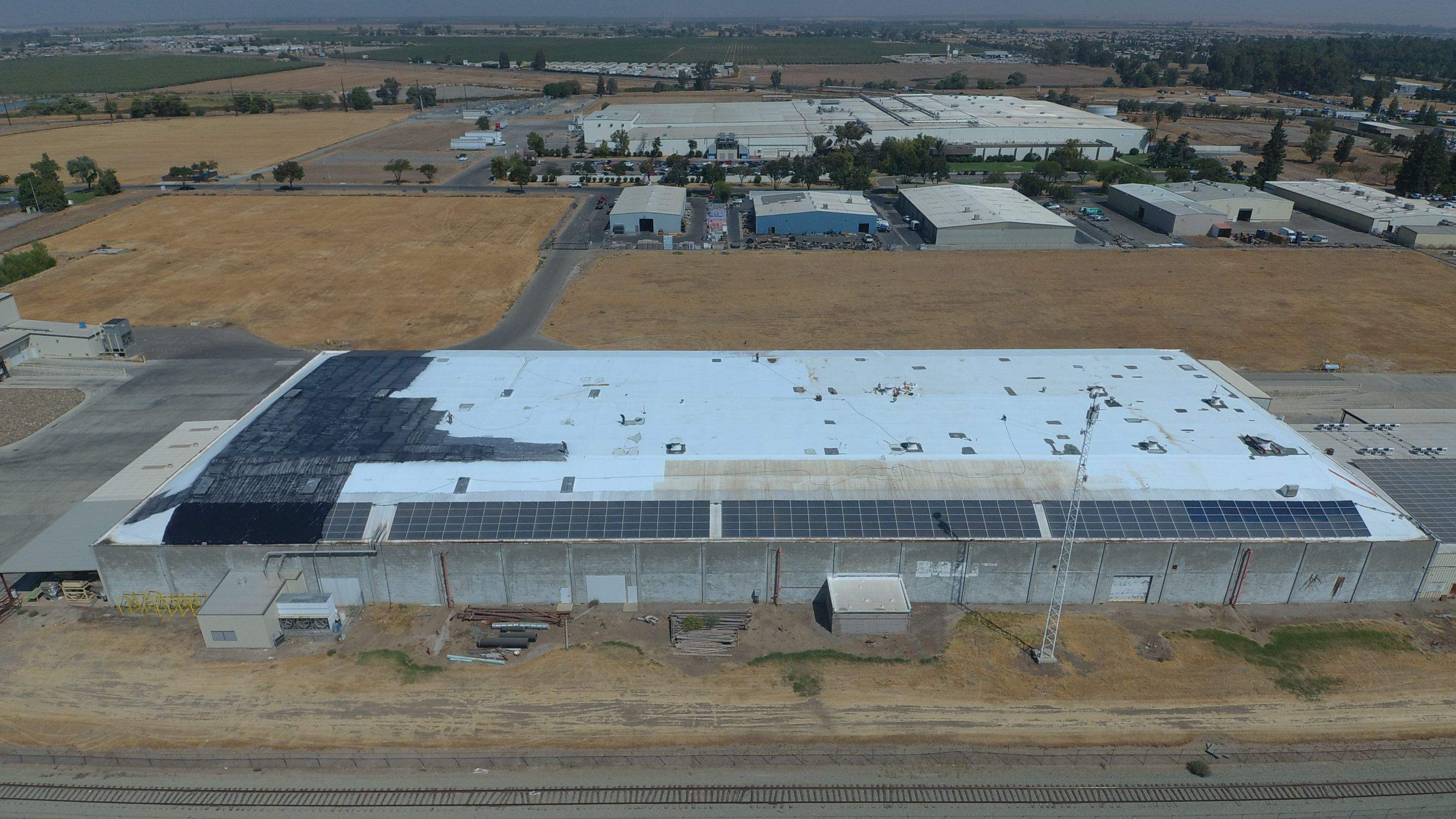 Single-ply restoration system using Conklin Benchmark/PUMA XL fabric and coating by Straight Edge Roofing Inc