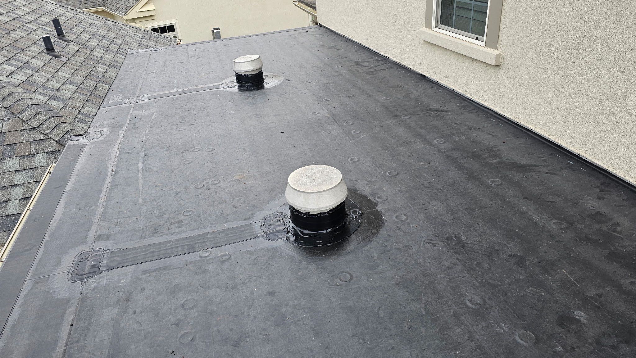 Rubber Roof Repair by KFX Roofing