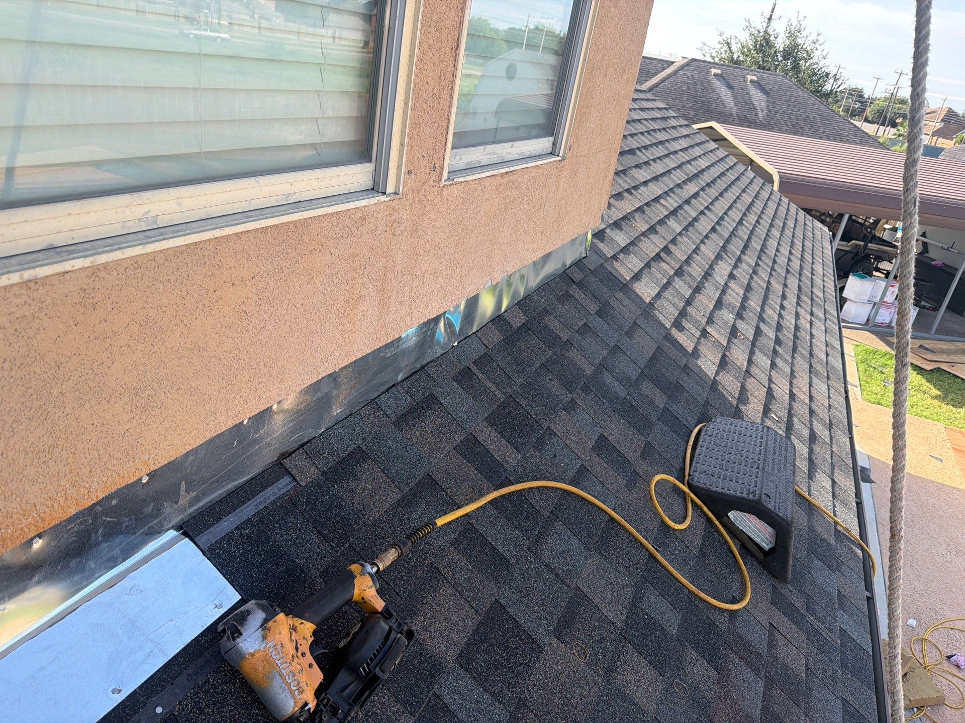 Flashing Stucco above the Roof by Bayfront Roofing and Construction