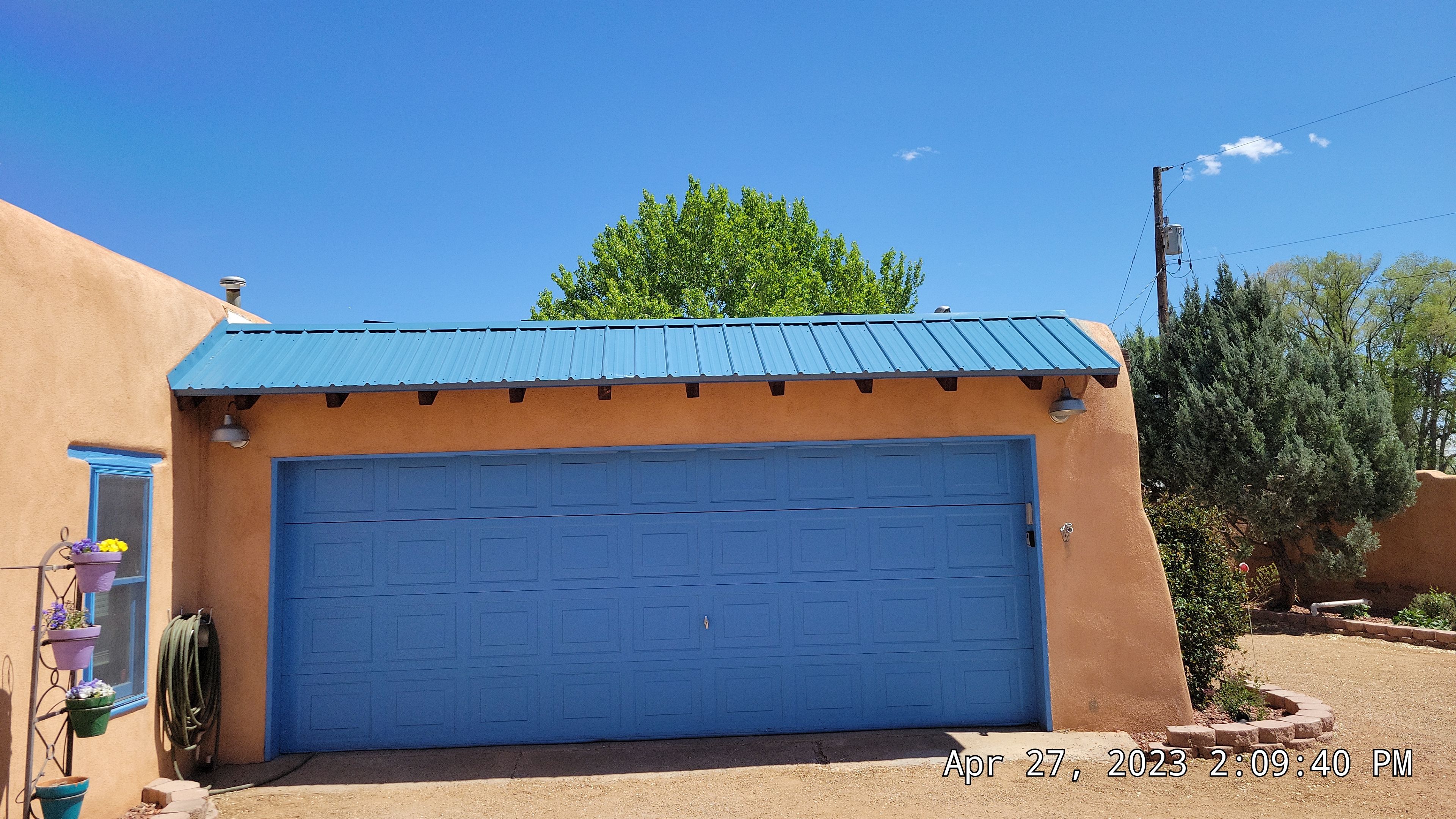 Hawaiian Blue metal Shed roof makeover in the North Valley by Doyle Roof Masters Inc