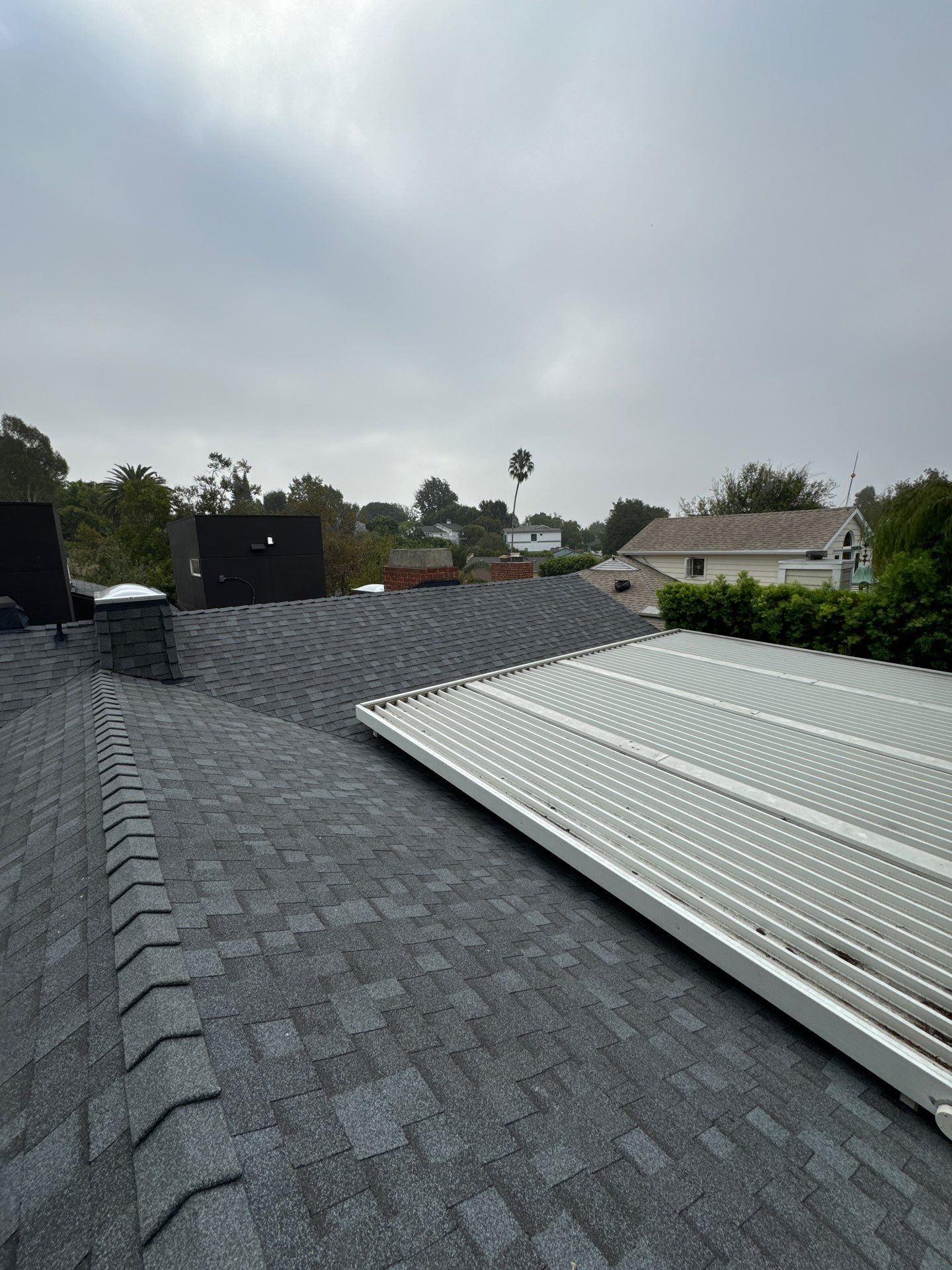 Residential Roofing Installation using Shingles and Silicone by Hull Brothers Roofing