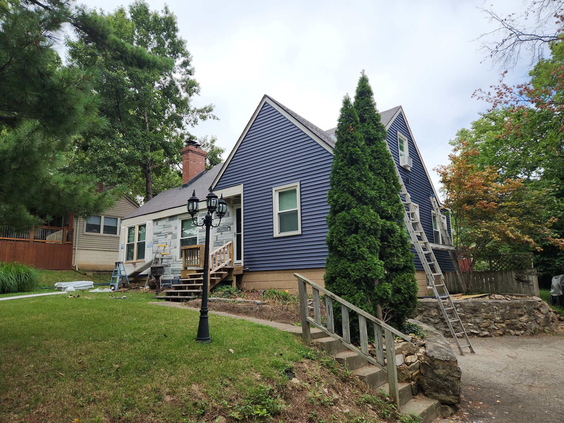 Kansas City Indigo Insulated Craneboard Siding and Window Replacement Project in Kansas City by EEC Windows, Siding & Roofing
